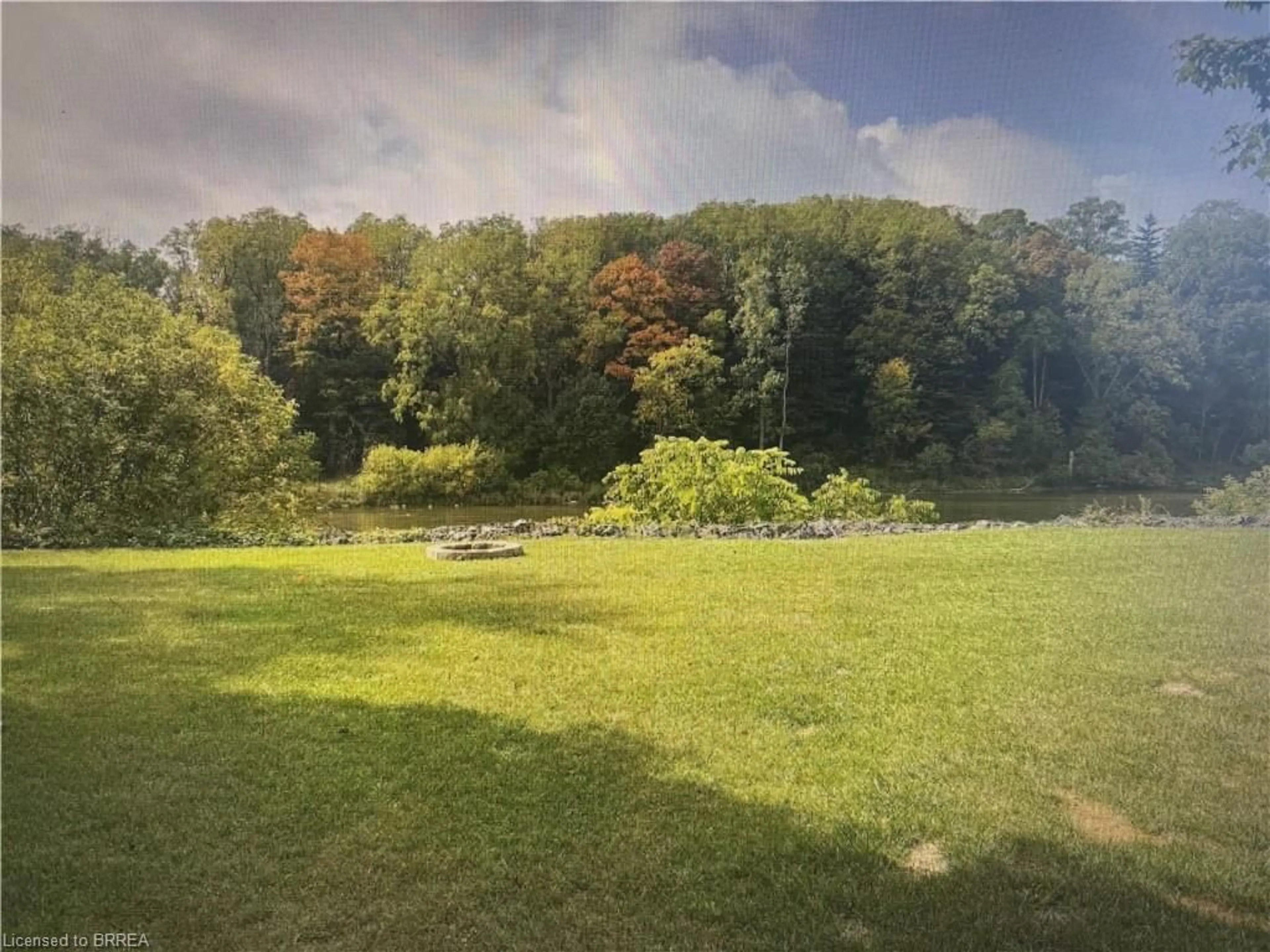 A pic from outside/outdoor area/front of a property/back of a property/a pic from drone, forest/trees view for 58 Willow St, Paris Ontario N3L 2K5