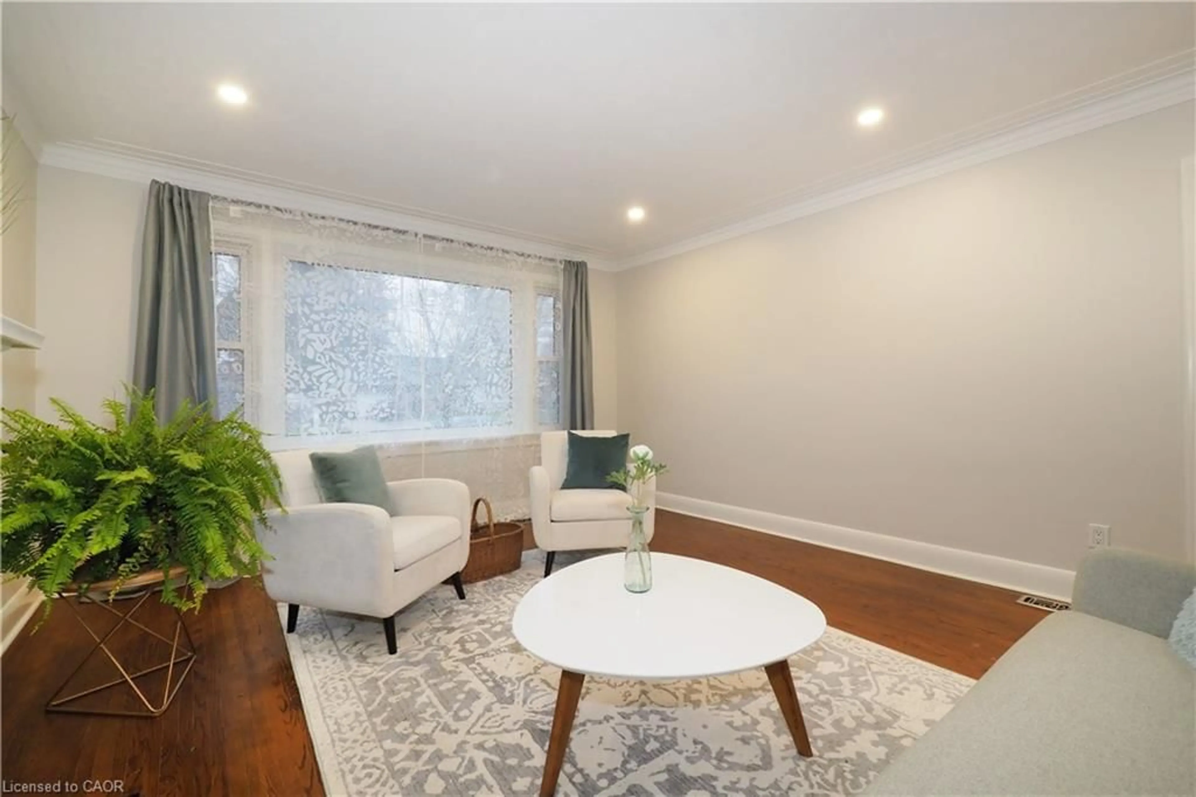 Living room with furniture, wood/laminate floor for 296 Dumfries Ave, Kitchener Ontario N2H 2E8