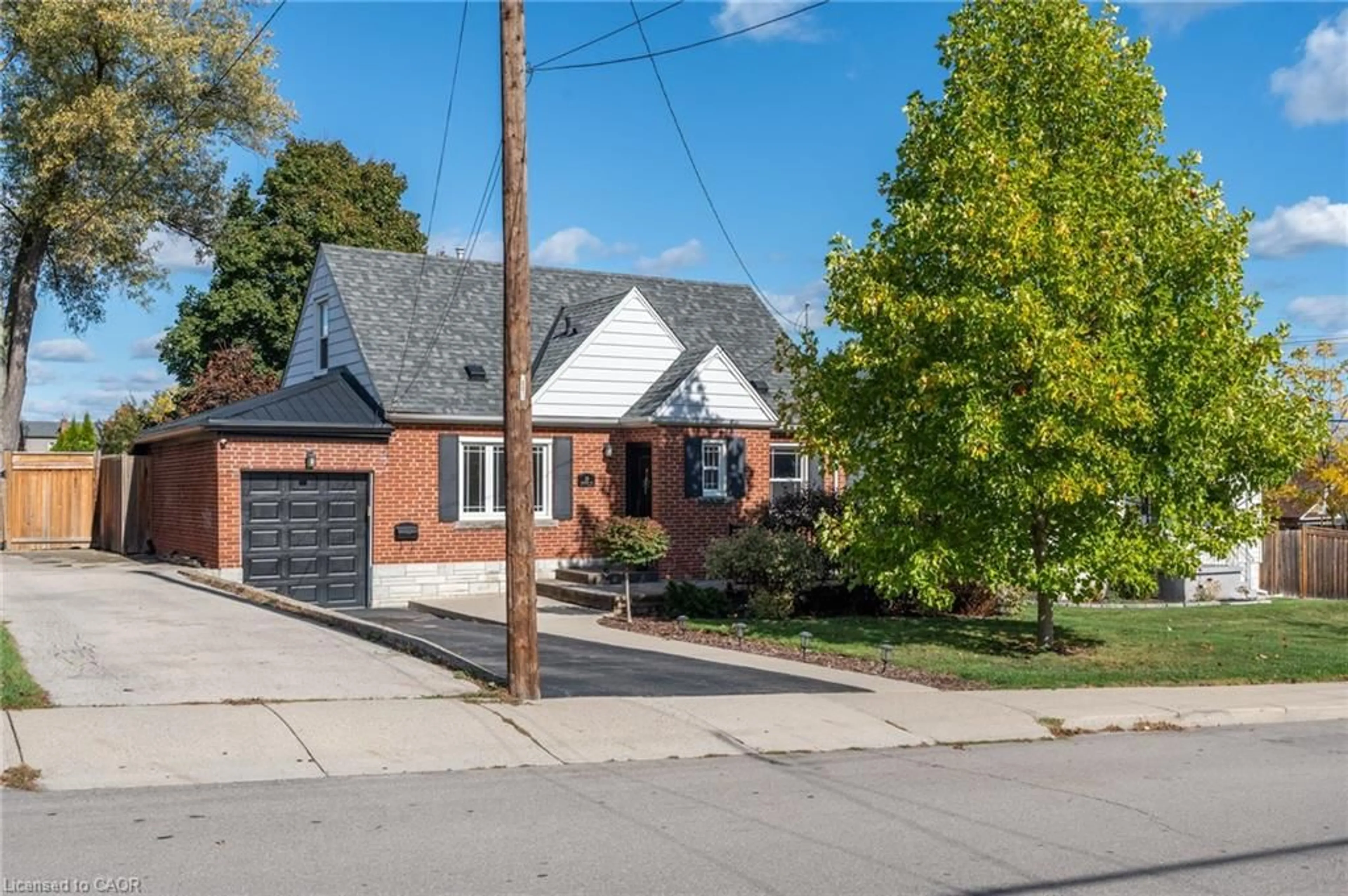 Home with brick exterior material, street for 25 Montrose Ave, Hamilton Ontario L8K 4X9