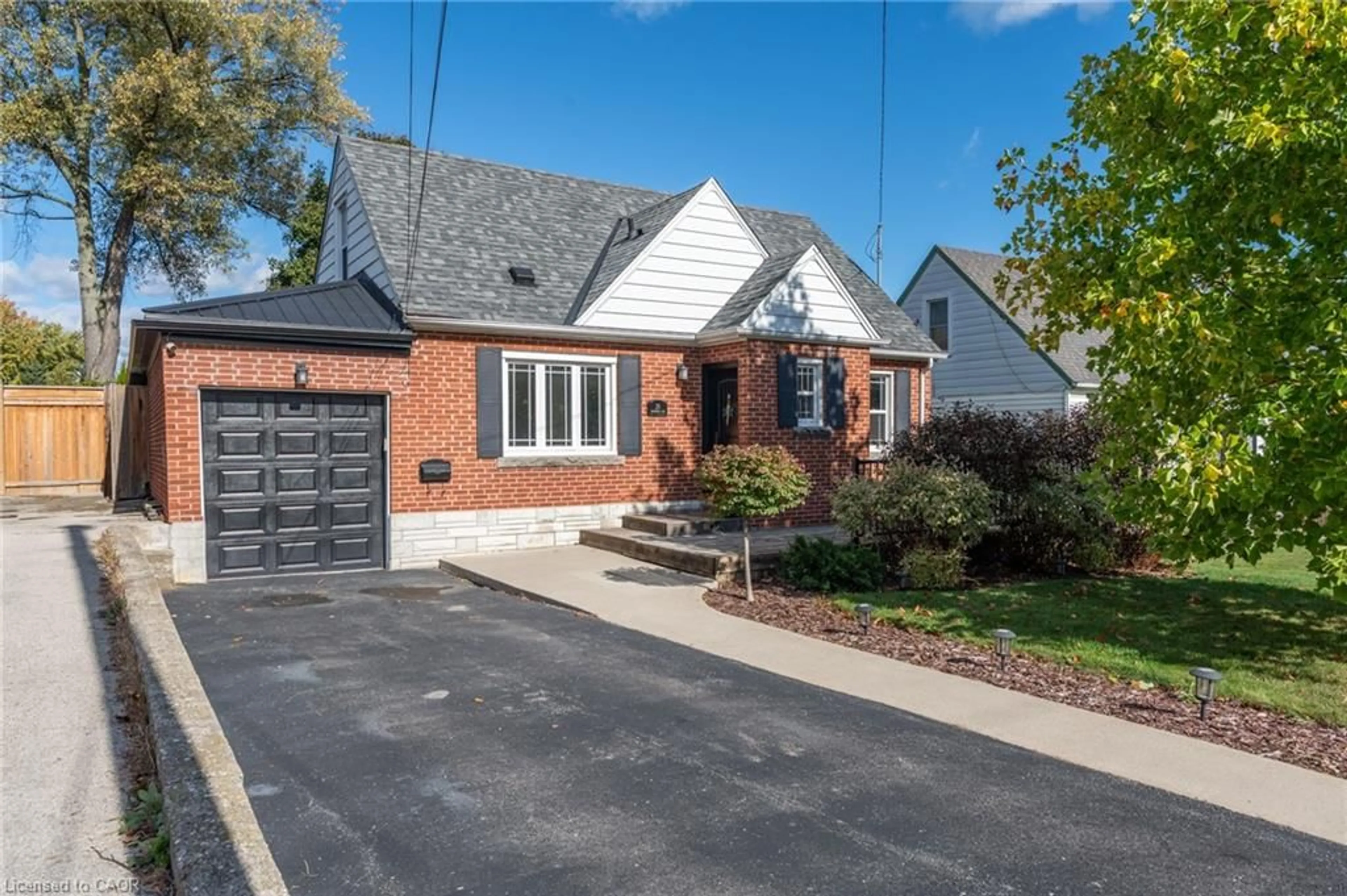 Home with brick exterior material, street for 25 Montrose Ave, Hamilton Ontario L8K 4X9