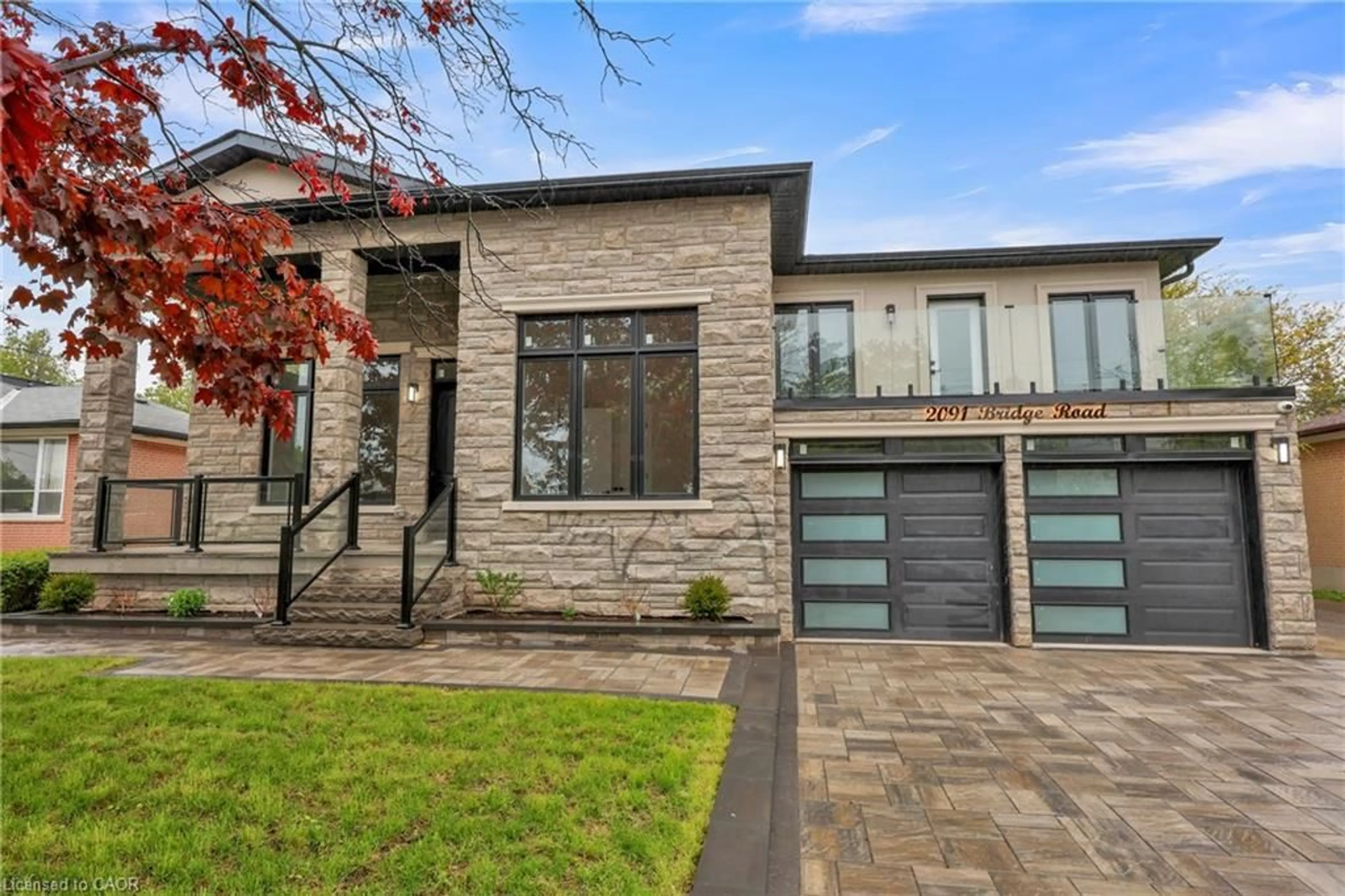 Home with brick exterior material, street for 2091 Bridge Rd, Oakville Ontario L6L 2E8