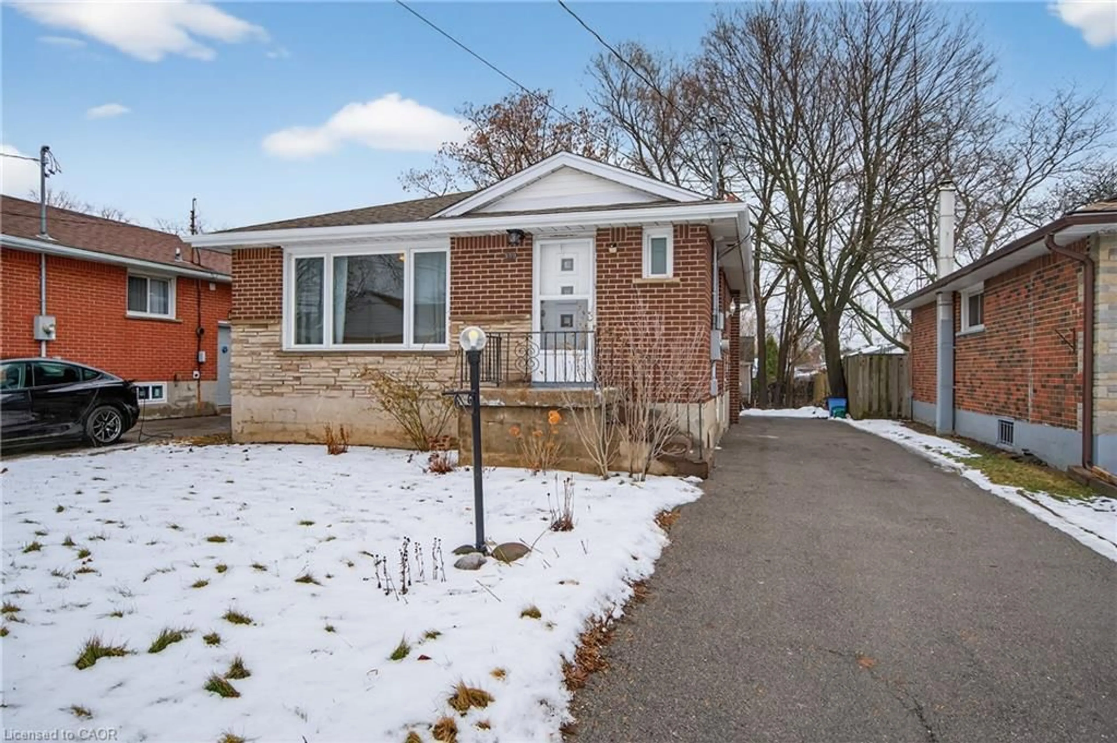 Home with brick exterior material, street for 399 East 15th St, Hamilton Ontario L9A 4G9