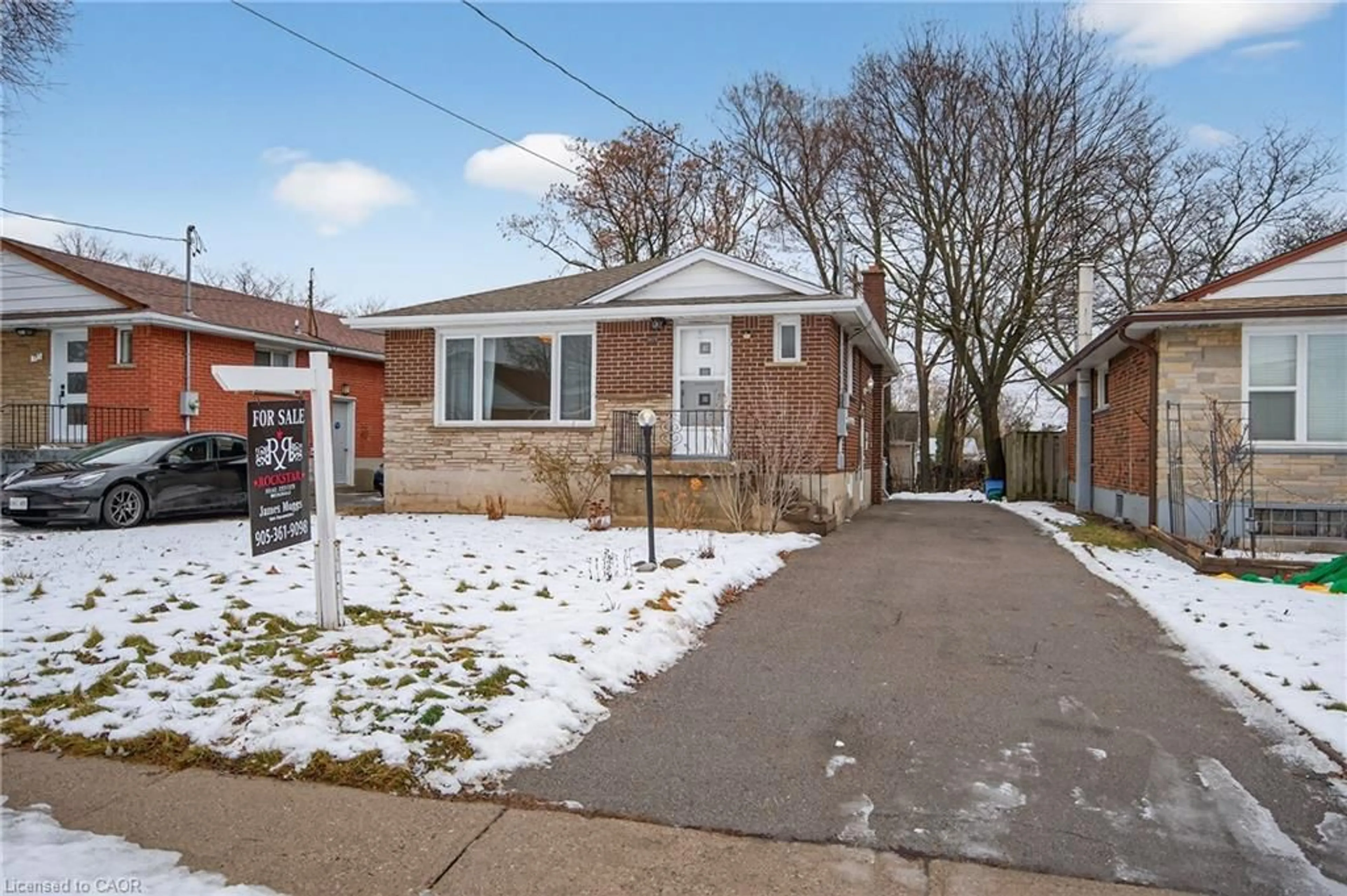 Home with brick exterior material, street for 399 East 15th St, Hamilton Ontario L9A 4G9