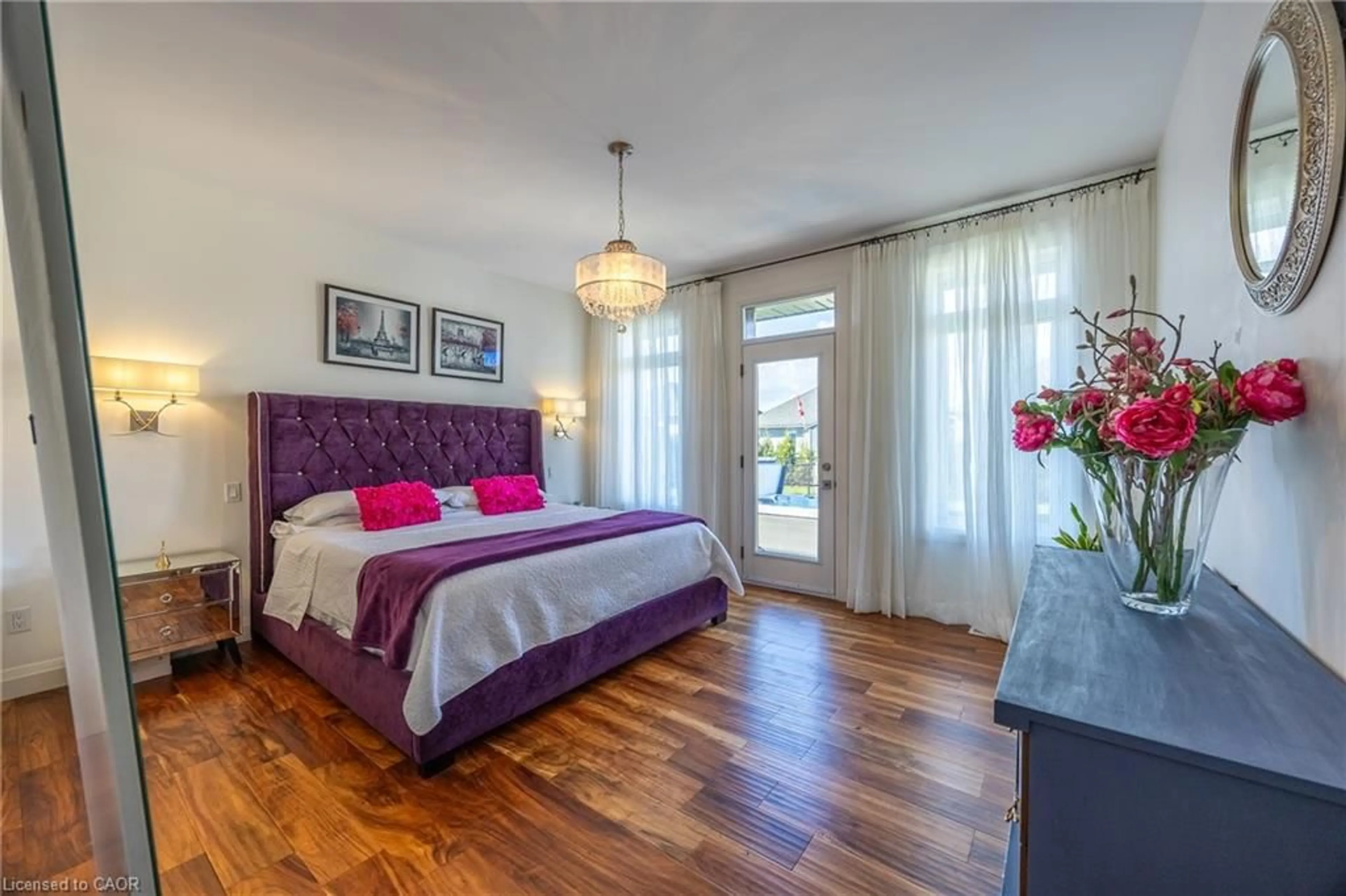 Bedroom with bed, wood/laminate floor for 80 Backus Dr, Port Rowan Ontario N0E 1M0