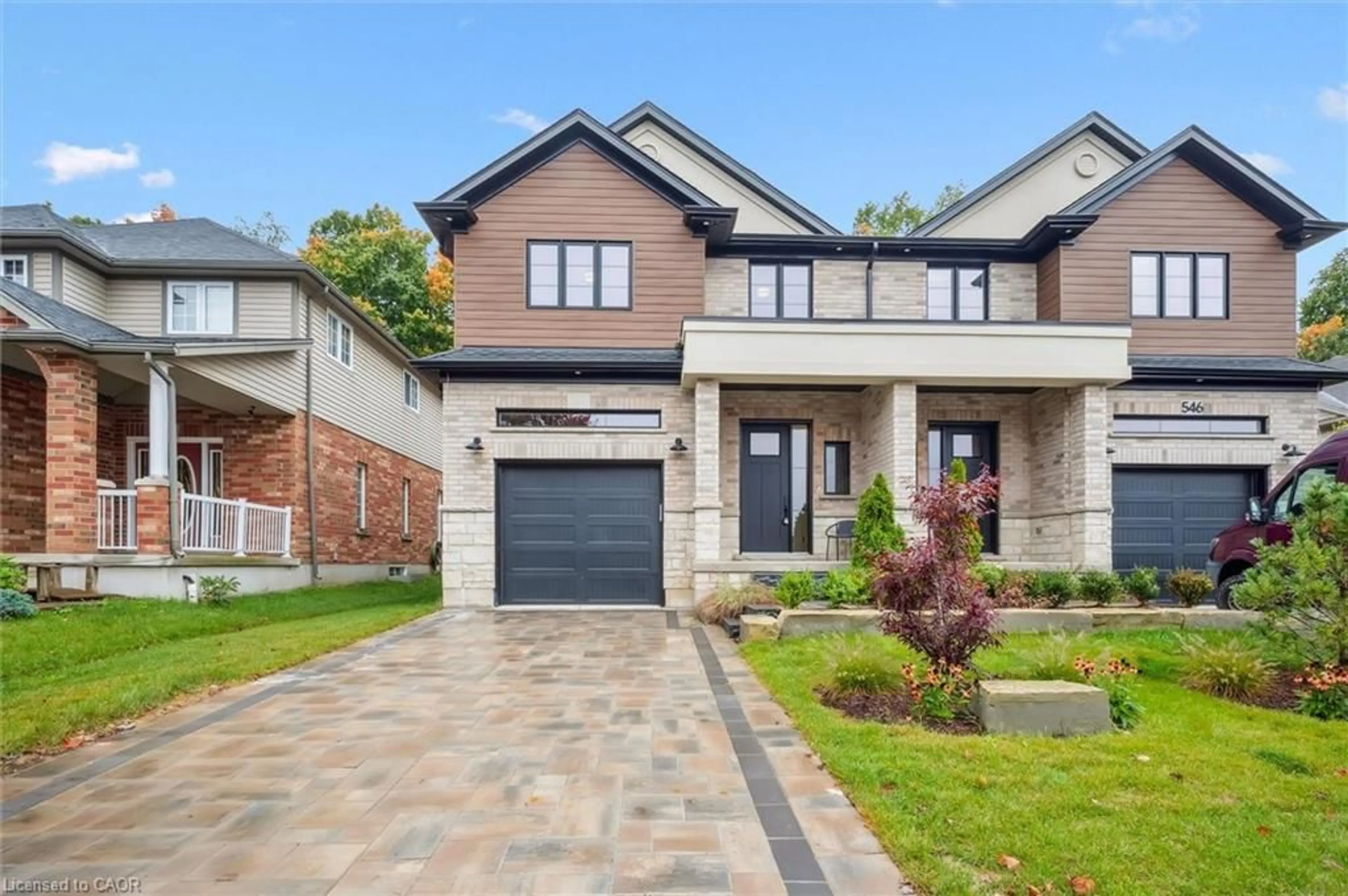 Home with brick exterior material, street for 548 Peach Blossom Crt, Kitchener Ontario N2E 3Z9