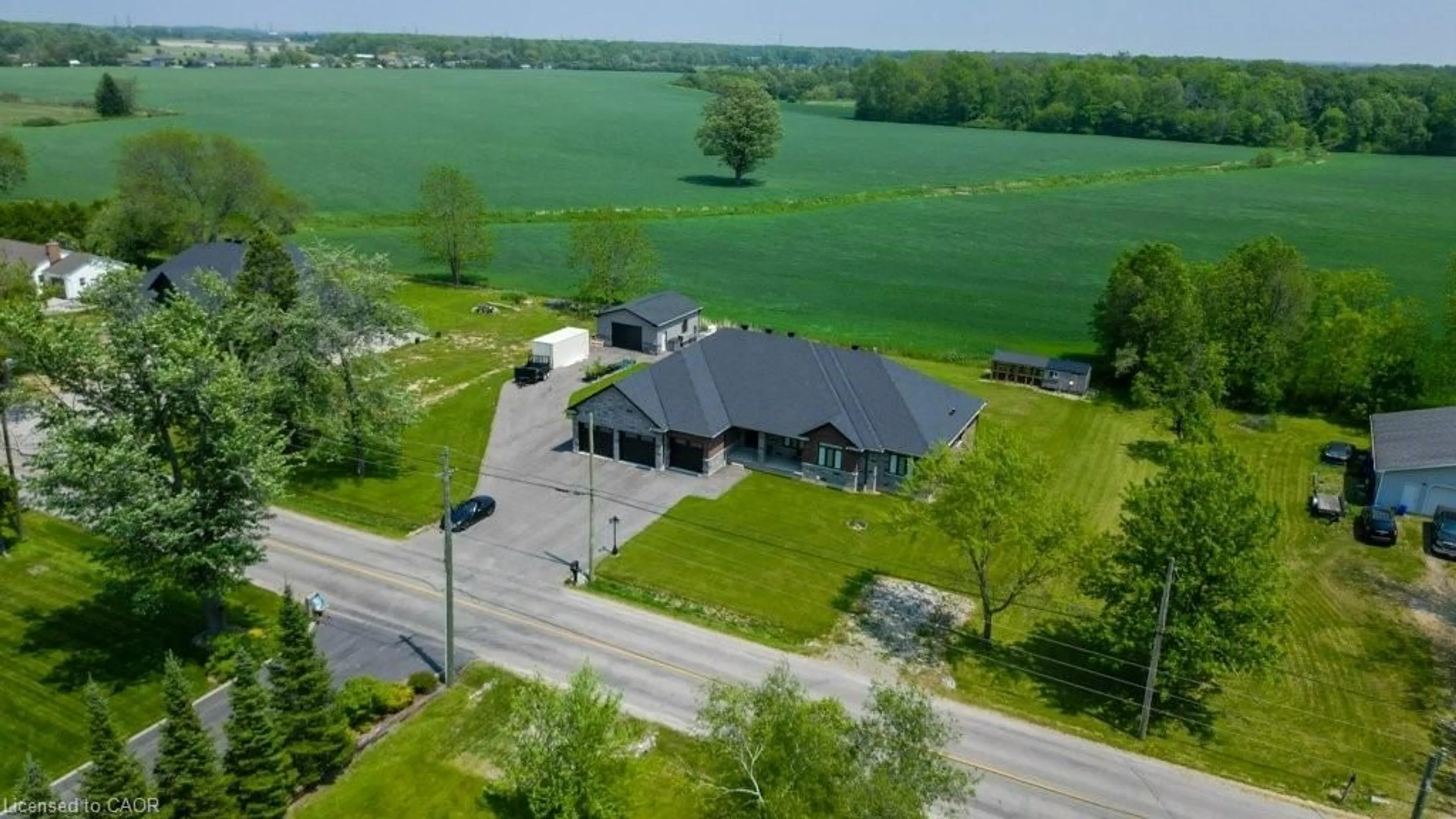 A pic from outside/outdoor area/front of a property/back of a property/a pic from drone, water/lake/river/ocean view for 1211 Woodburn Rd, Binbrook Ontario L0R 1P0