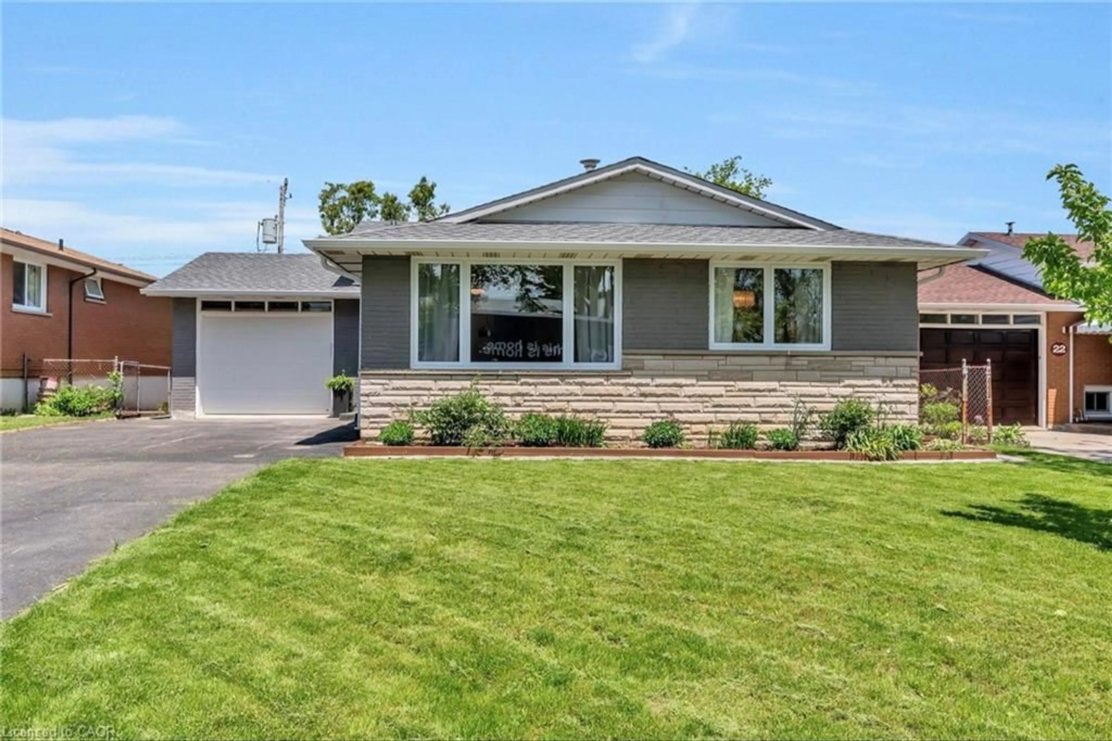 Home with vinyl exterior material, street for 24 Darlington Dr, Hamilton Ontario L9C 2L7