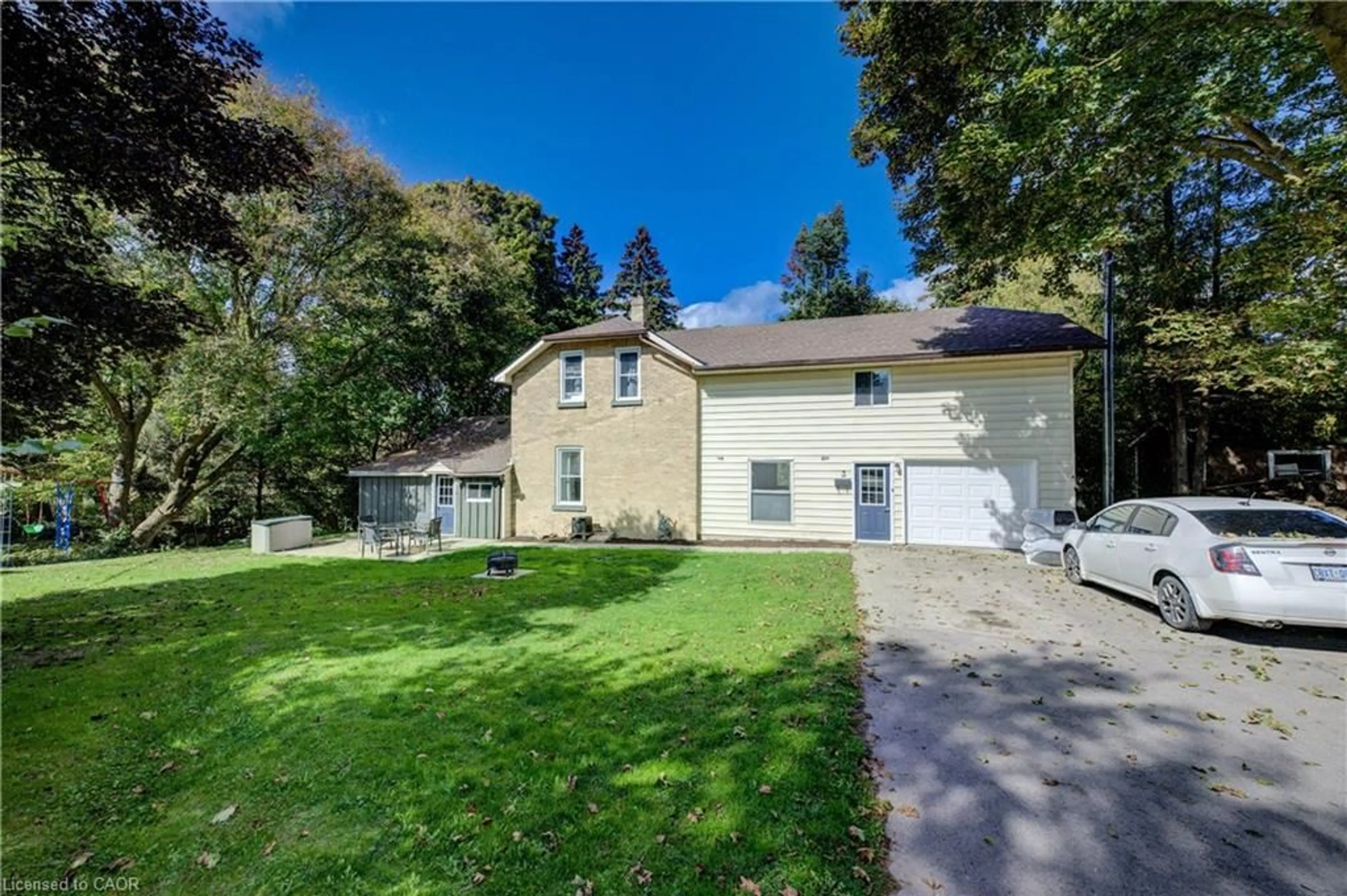 A pic from outside/outdoor area/front of a property/back of a property/a pic from drone, street for 3 Page St, Mount Forest Ontario N0G 2L3