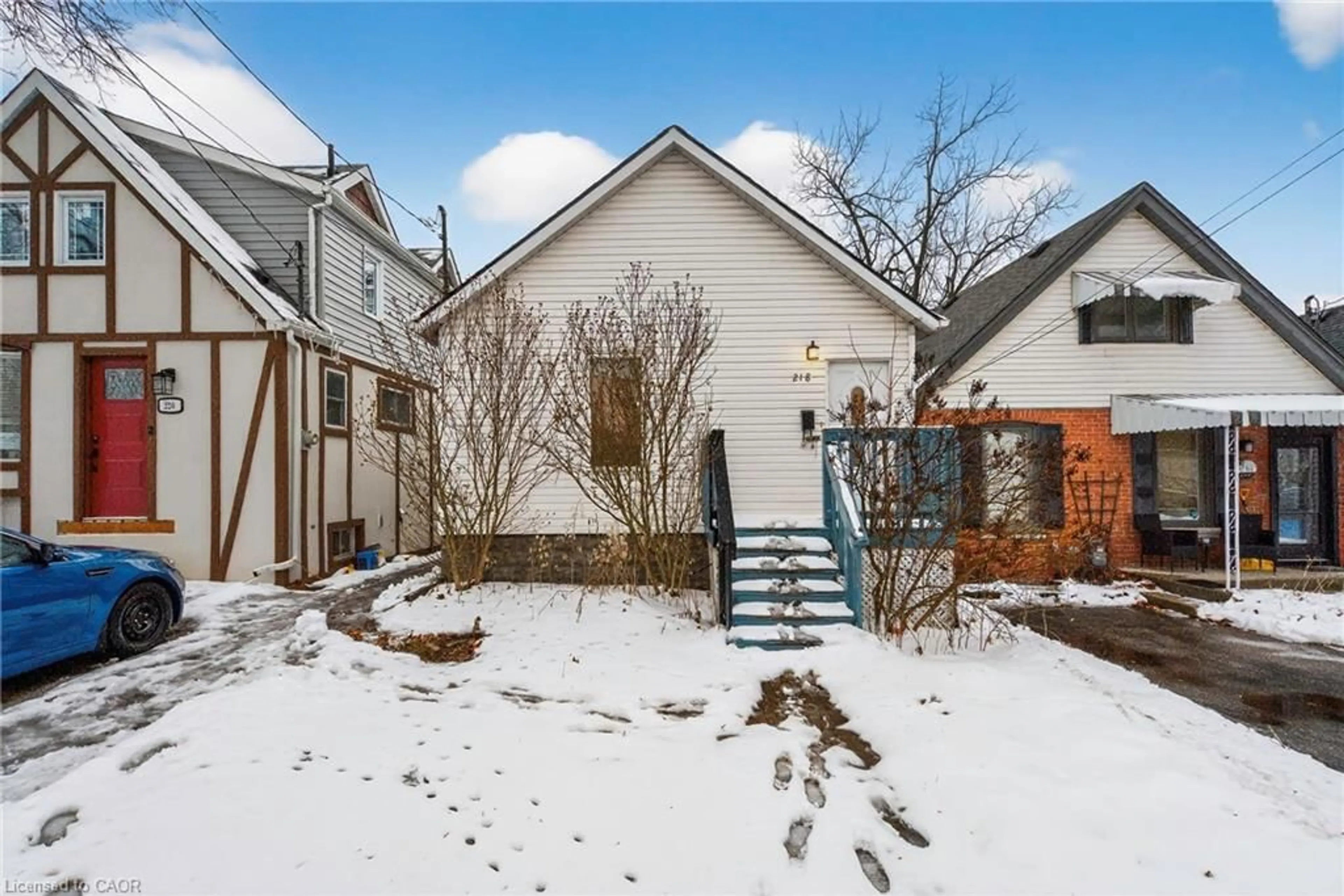 A pic from outside/outdoor area/front of a property/back of a property/a pic from drone, street for 218 East 8th St, Hamilton Ontario L9A 3L8