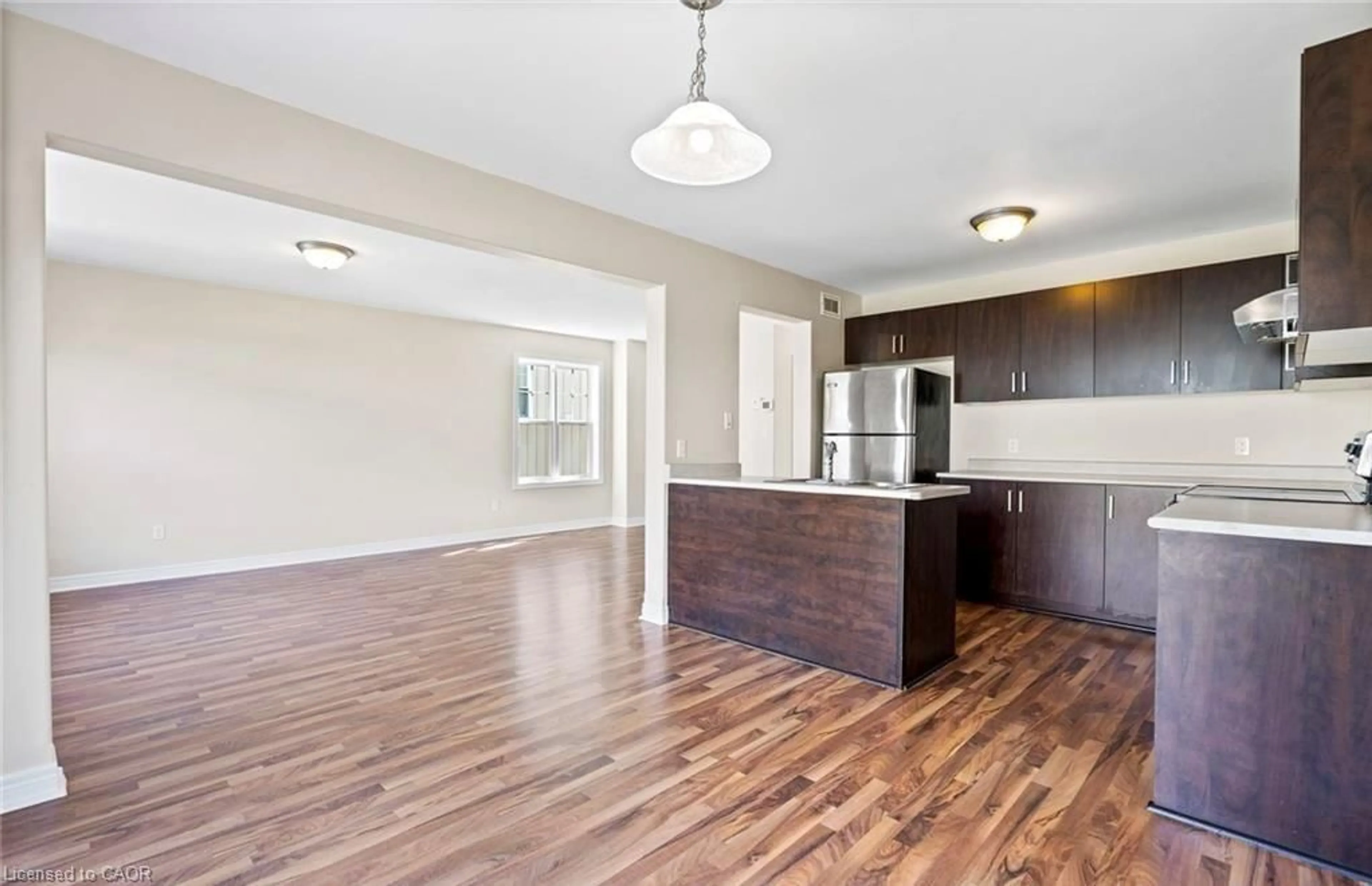 Open concept kitchen, wood/laminate floor for 36 Chicory Cres, St. Catharines Ontario L2R 6K7