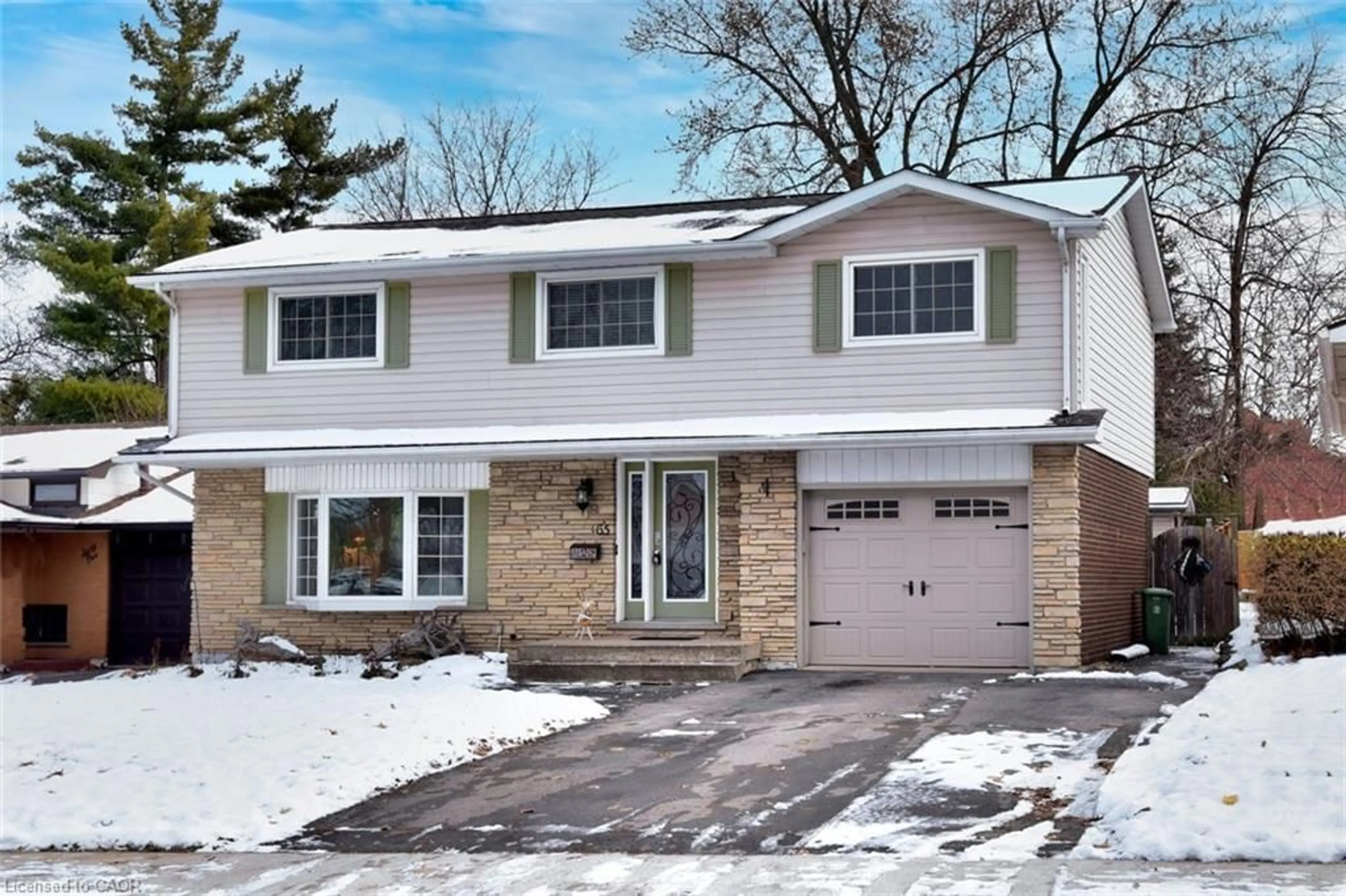 Home with brick exterior material, street for 65 Rolston Dr, Hamilton Ontario L9C 3X6