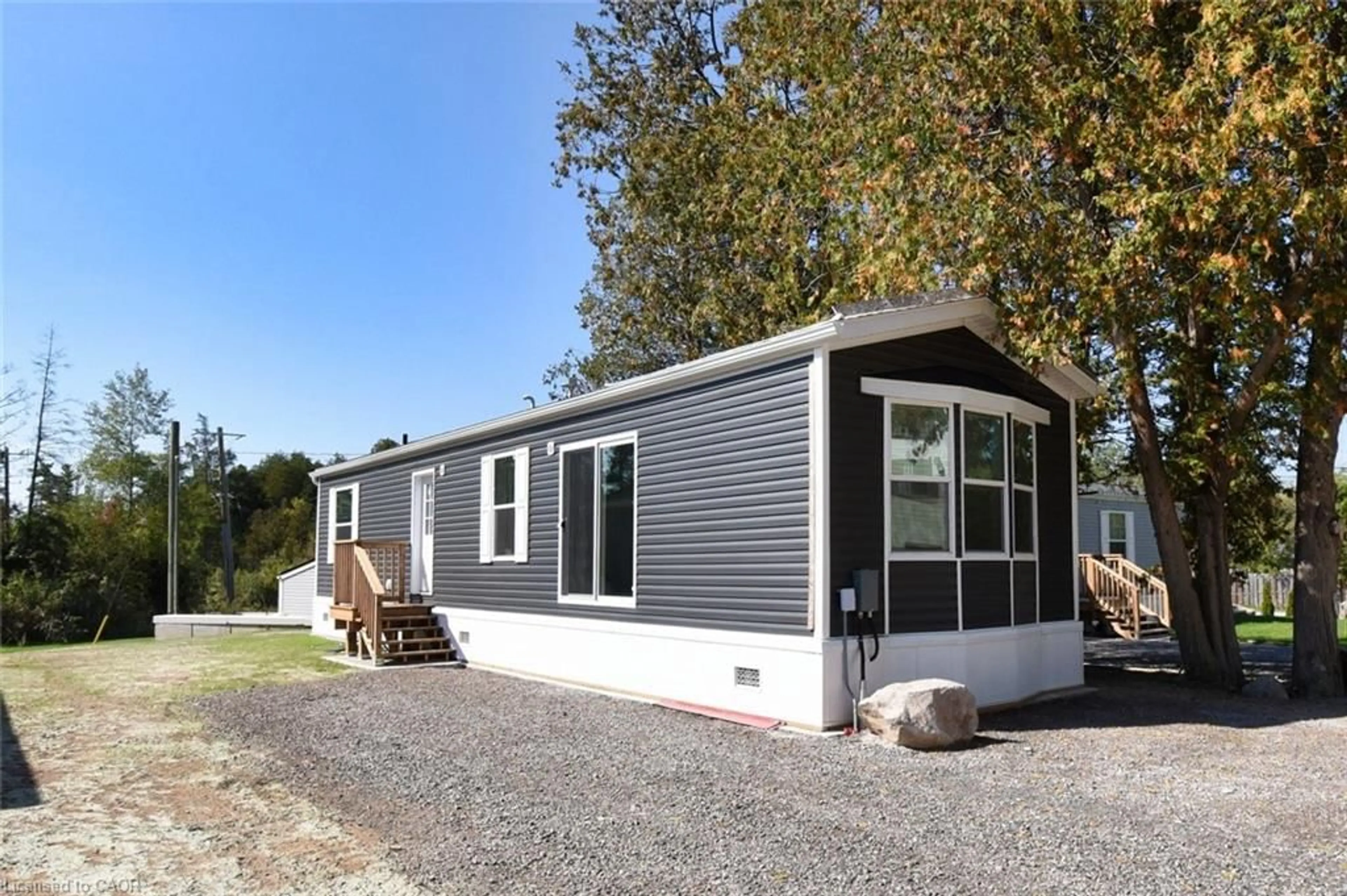 Home with vinyl exterior material, street for 1085 Concession 10 Rd #23, Flamborough Ontario N0B 2J0