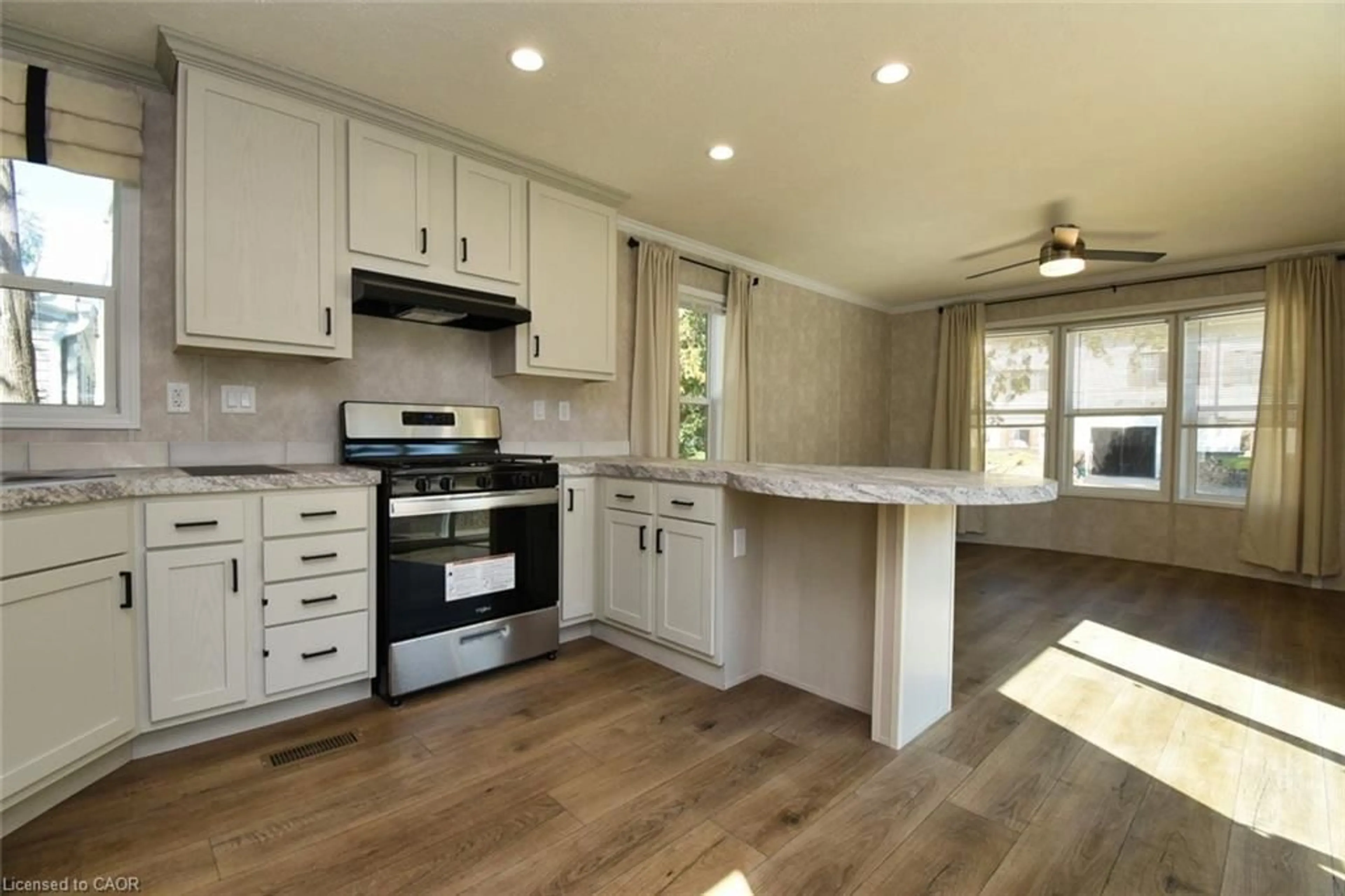 Open concept kitchen, wood/laminate floor for 1085 Concession 10 Rd #23, Flamborough Ontario N0B 2J0