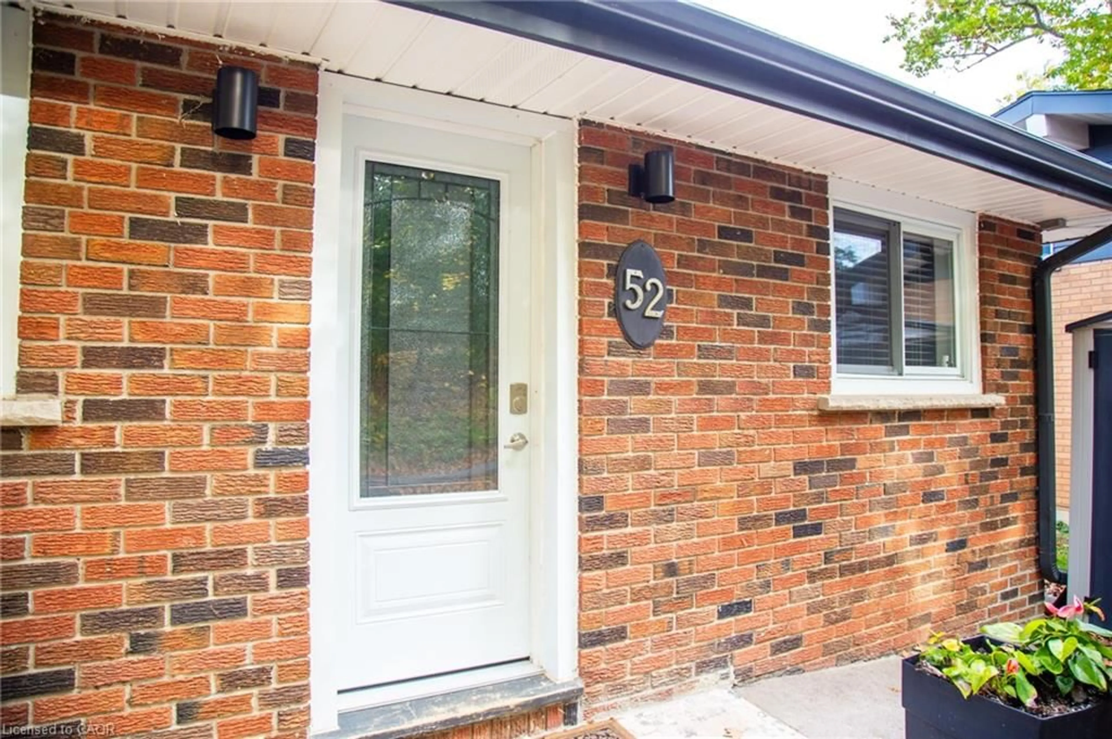 Home with brick exterior material, street for 52 Grand St, Port Dover Ontario N0A 1N7