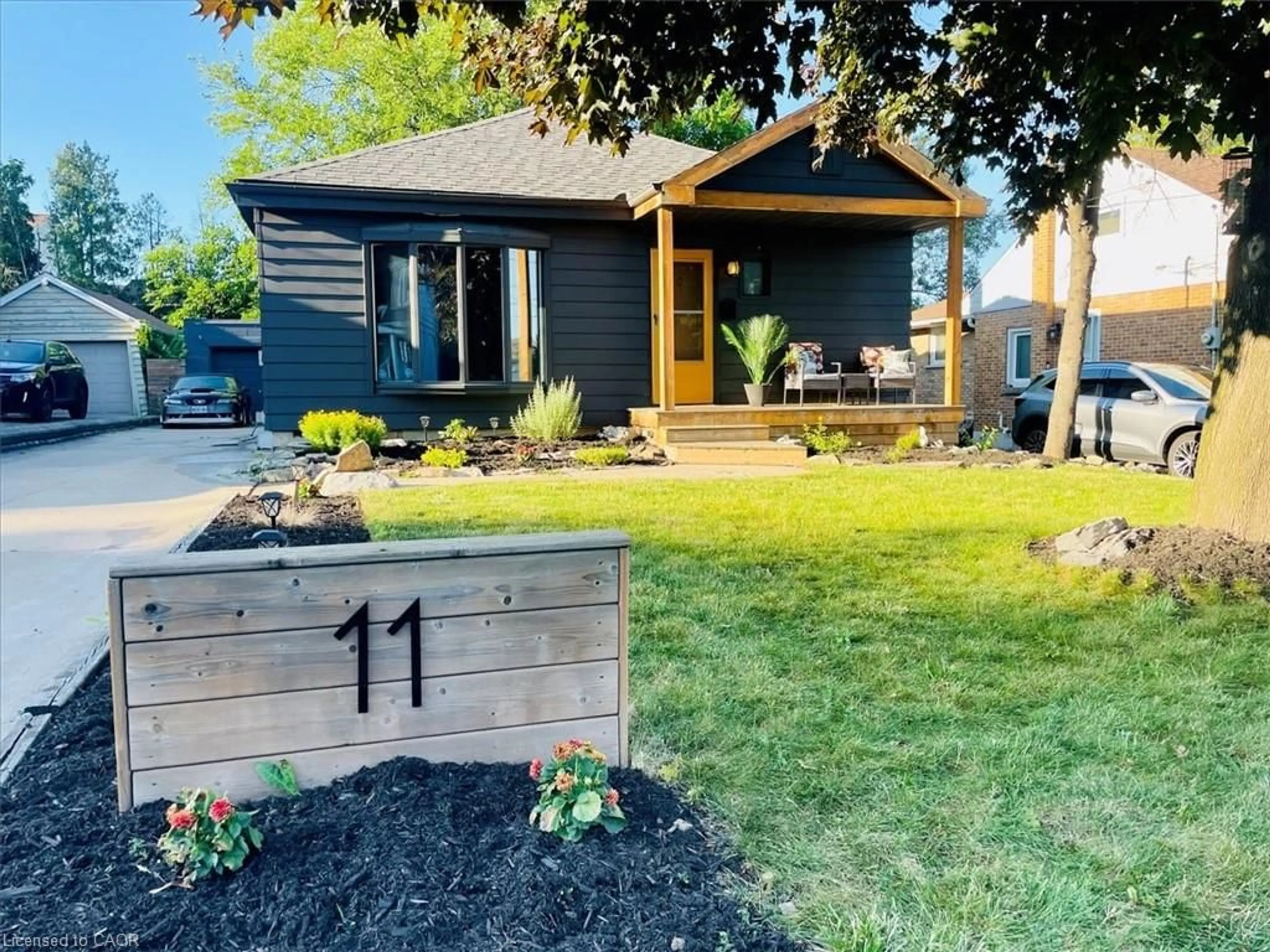 Home with vinyl exterior material, street for 11 Scotia Ave, Hamilton Ontario L8K 4X4