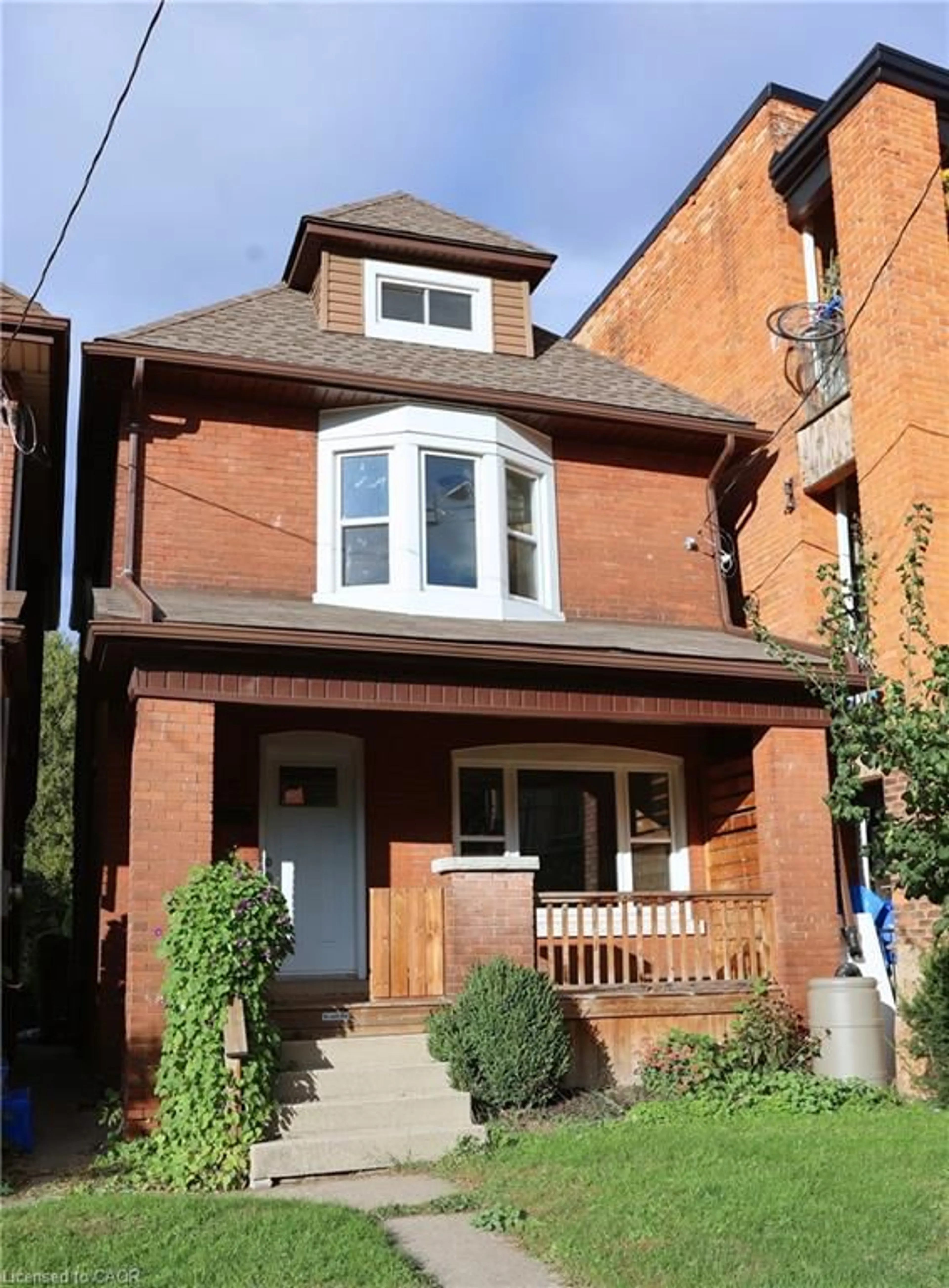 Home with brick exterior material, street for 451 King William St, Hamilton Ontario L8L 1R1