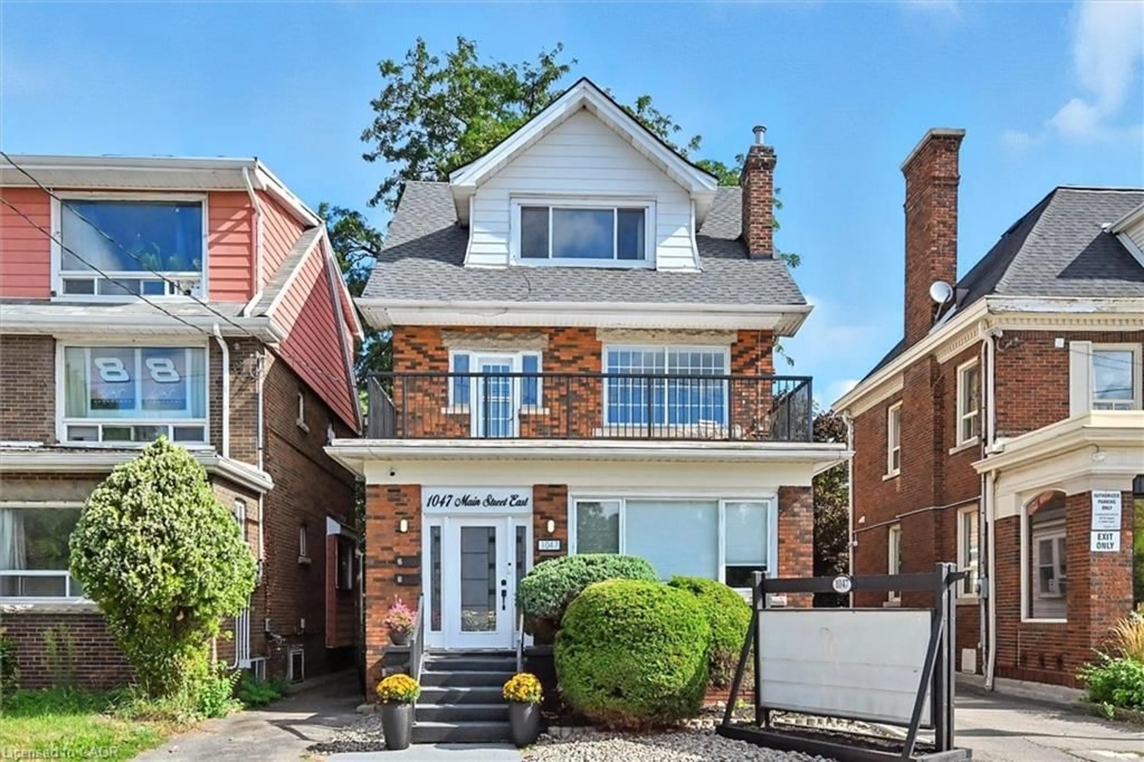 Home with brick exterior material, street for 1047 Main St, Hamilton Ontario L8M 1N5