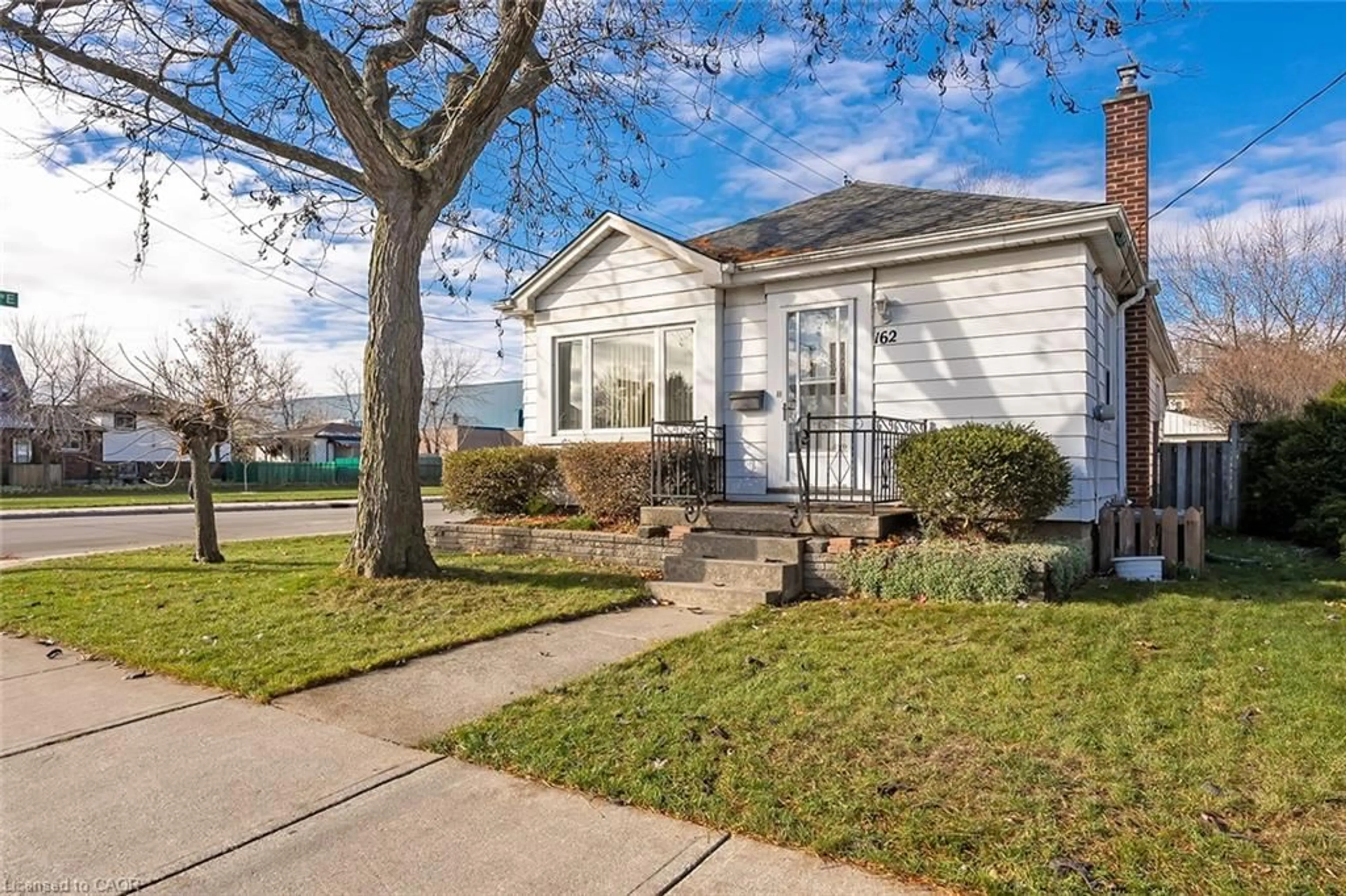Home with vinyl exterior material, street for 162 East 18th St, Hamilton Ontario L9A 4P1