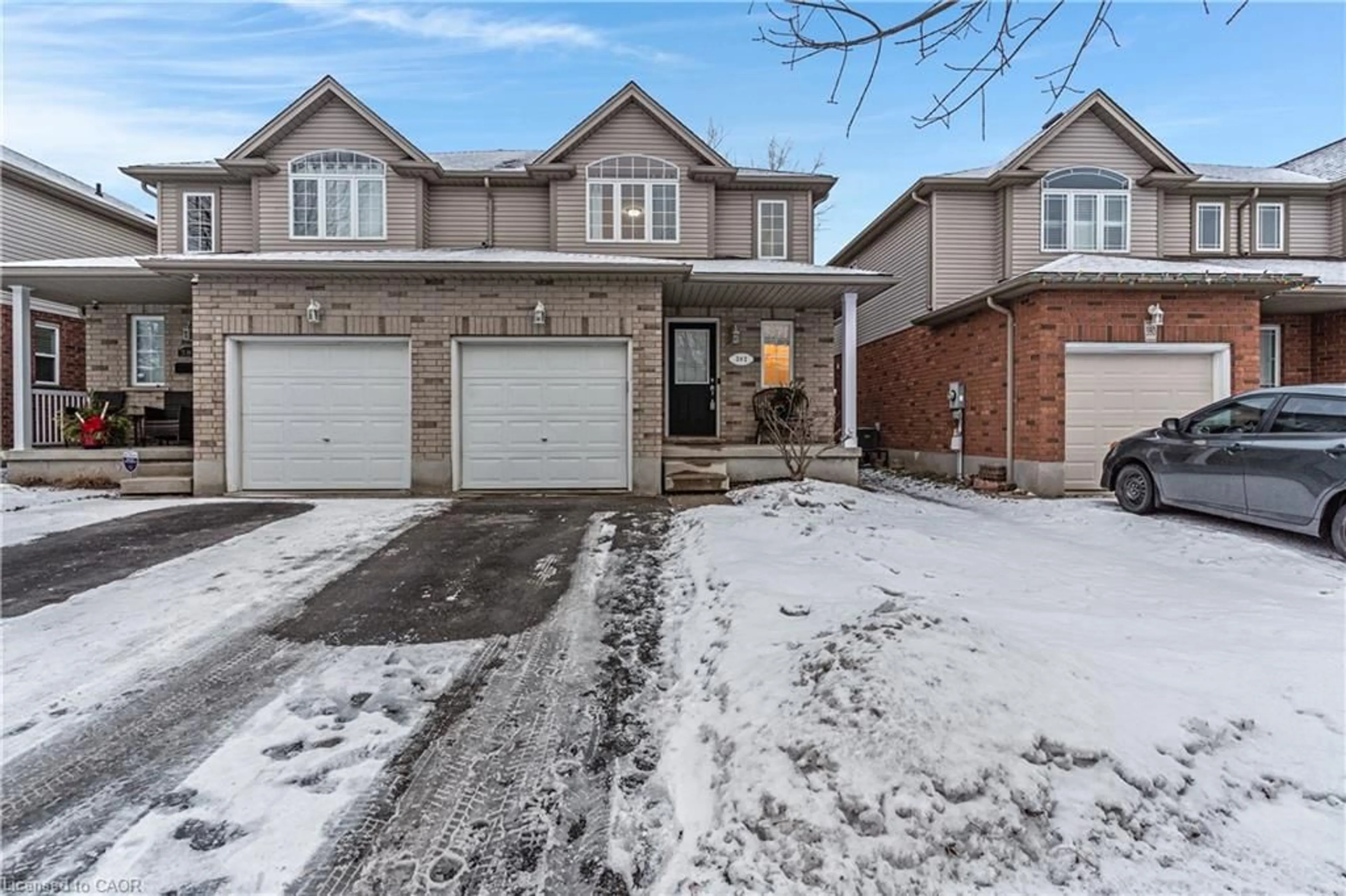Home with brick exterior material, street for 382 Pastern Trail, Waterloo Ontario N2K 4K7