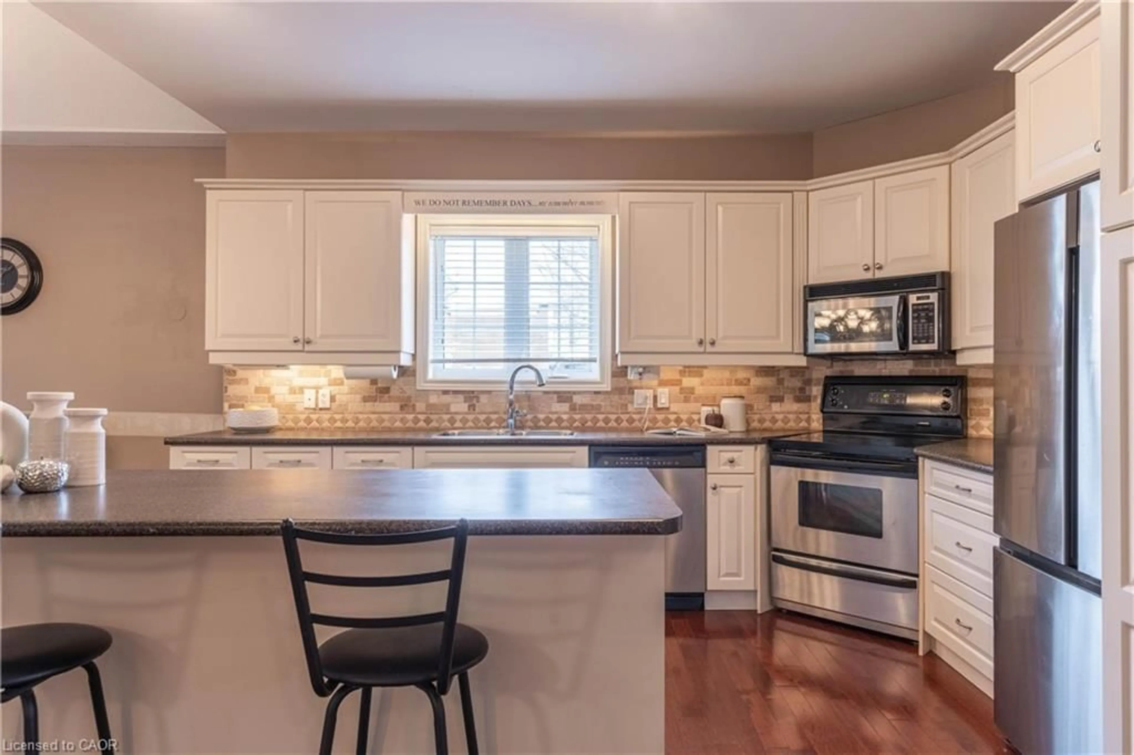 Open concept kitchen, ceramic/tile floor for 8142 Costabile Dr #7, Niagara Falls Ontario L2H 3M3