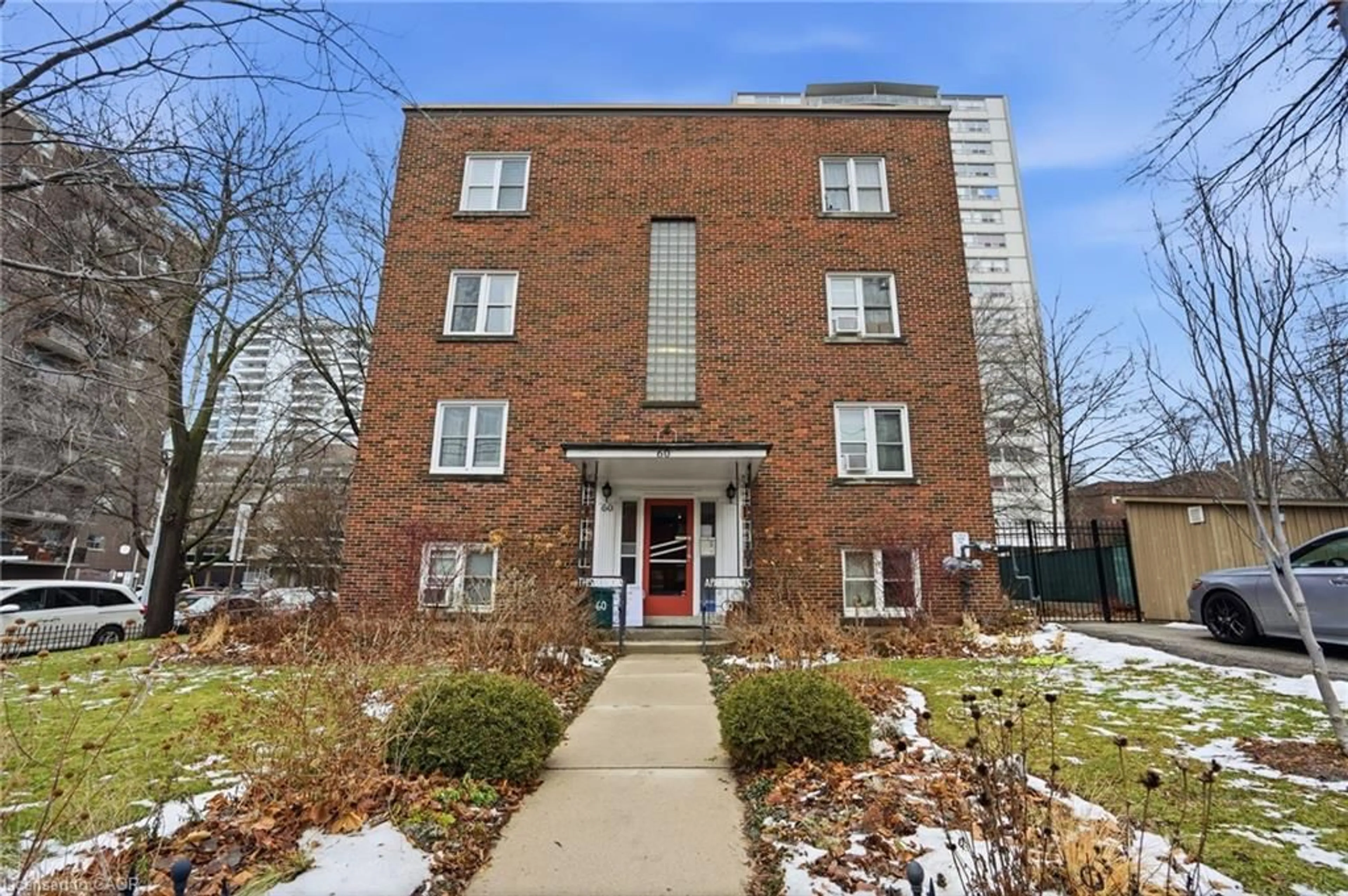 Home with brick exterior material, building for 60 Robinson St #104, Hamilton Ontario L8P 1Y9