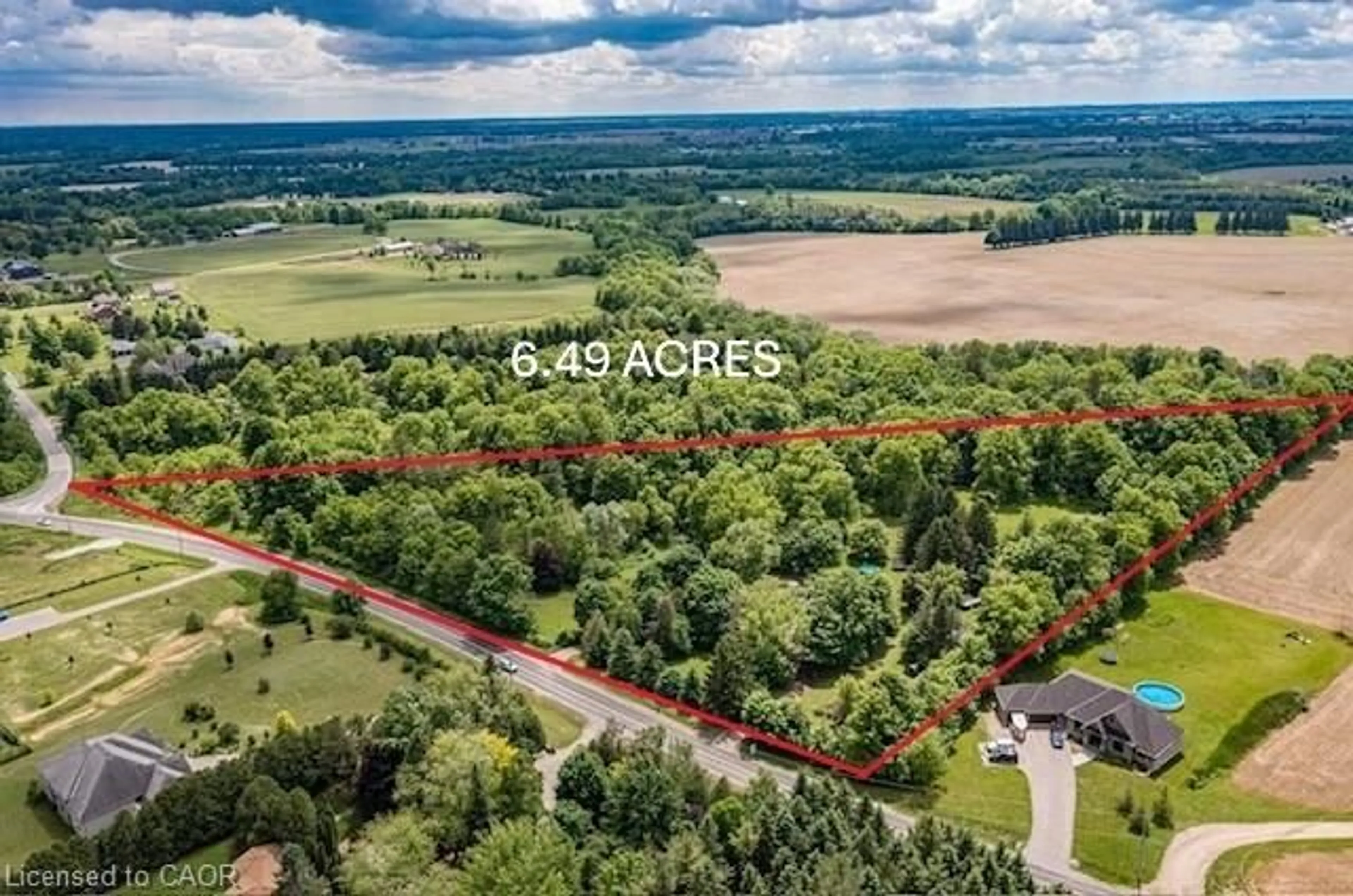 A pic from outside/outdoor area/front of a property/back of a property/a pic from drone, forest/trees view for 99 Mcbay Rd, Brantford Ontario N3T 5L4