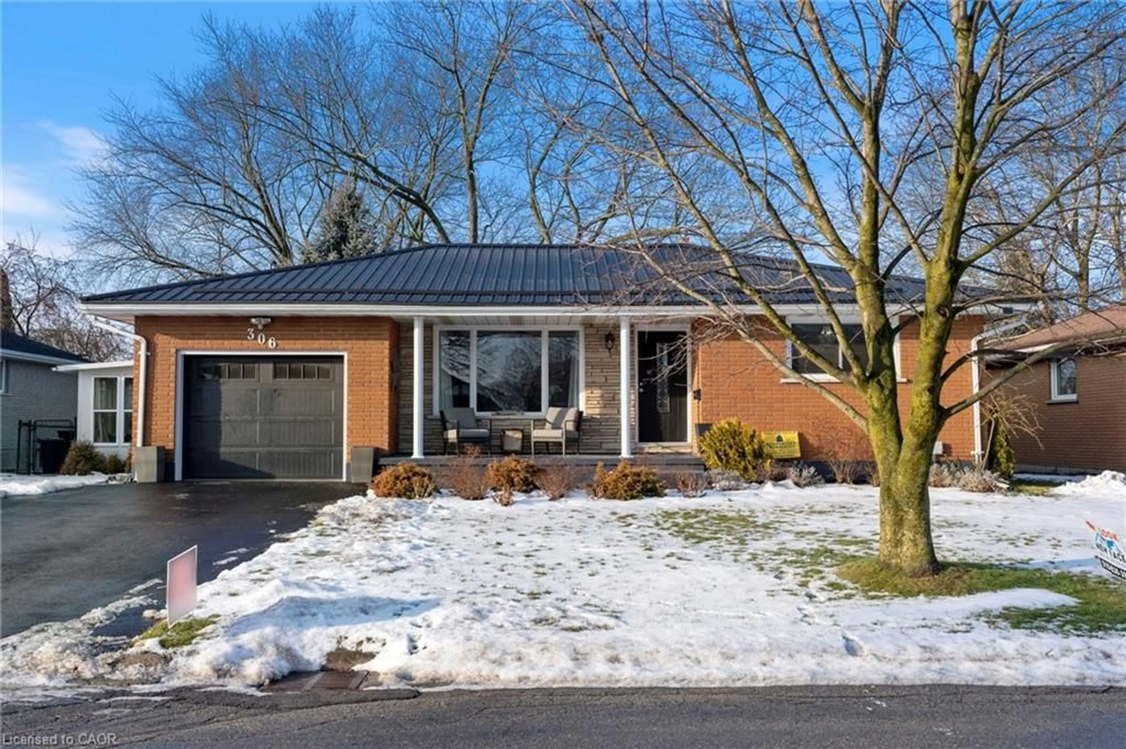 Home with brick exterior material, street for 306 Adams Ave, Delhi Ontario N4B 2Y5