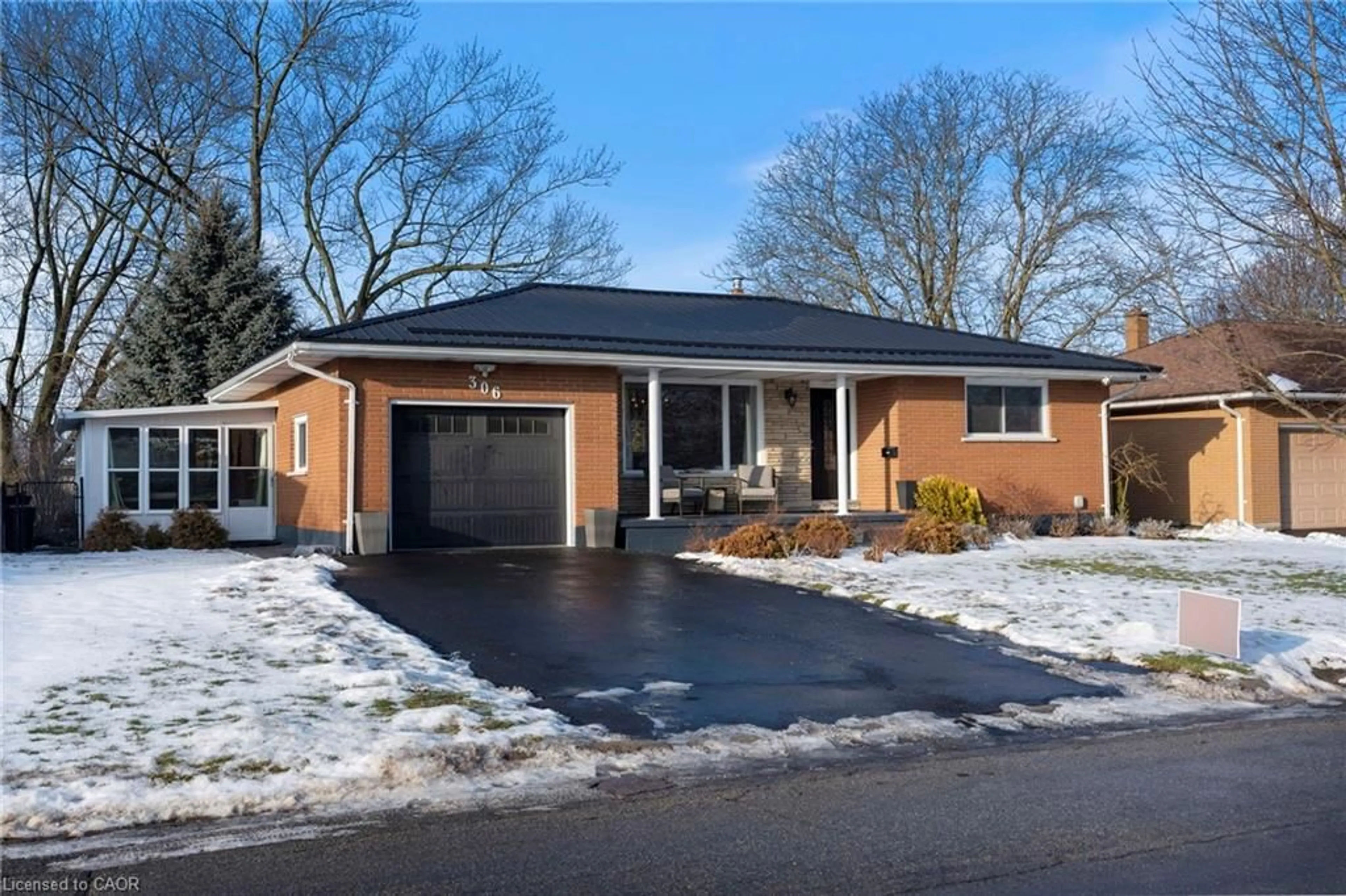 Home with brick exterior material, street for 306 Adams Ave, Delhi Ontario N4B 2Y5