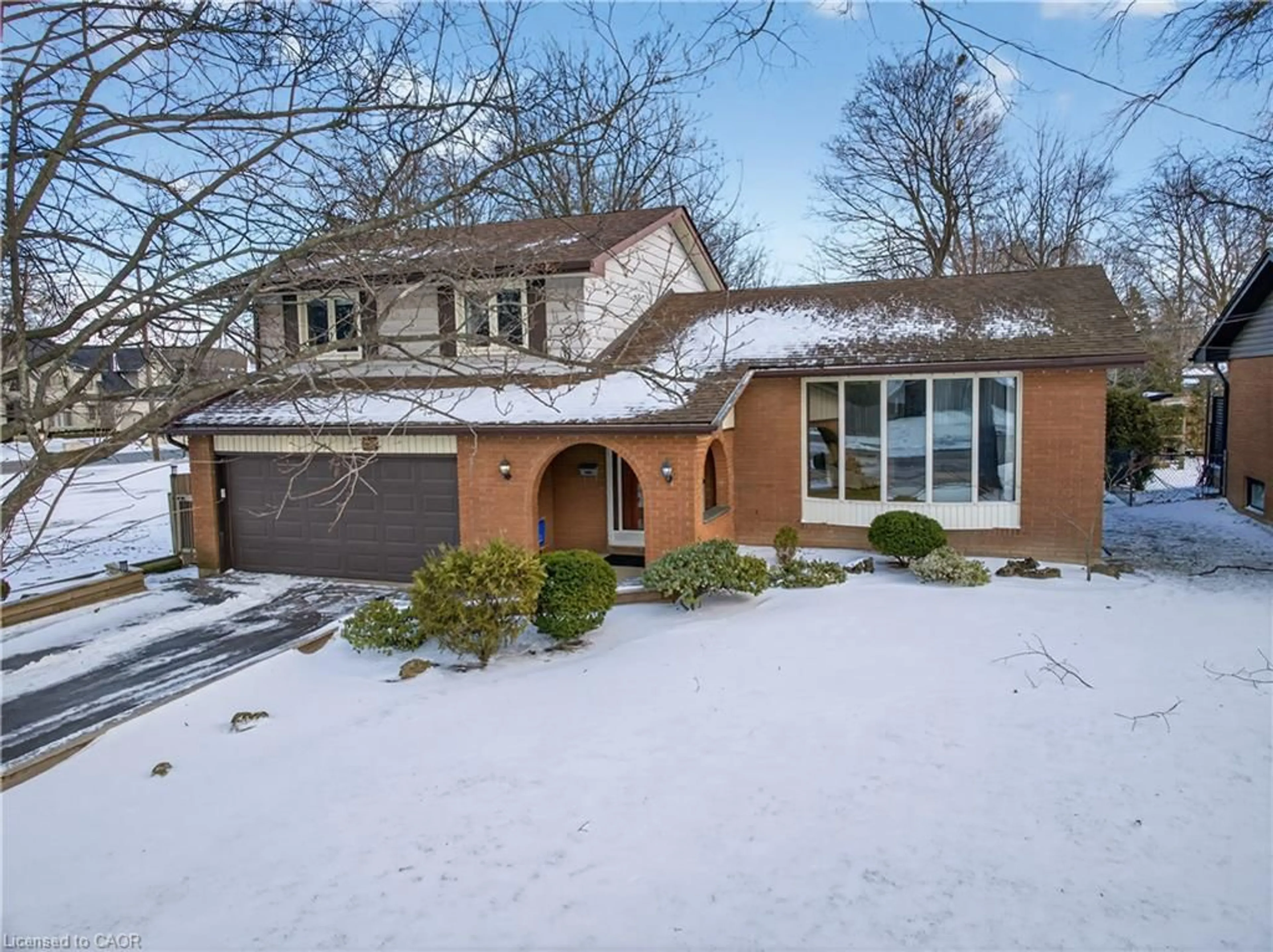 Home with brick exterior material, street for 77 Upper Paradise Rd, Hamilton Ontario L9C 5B6