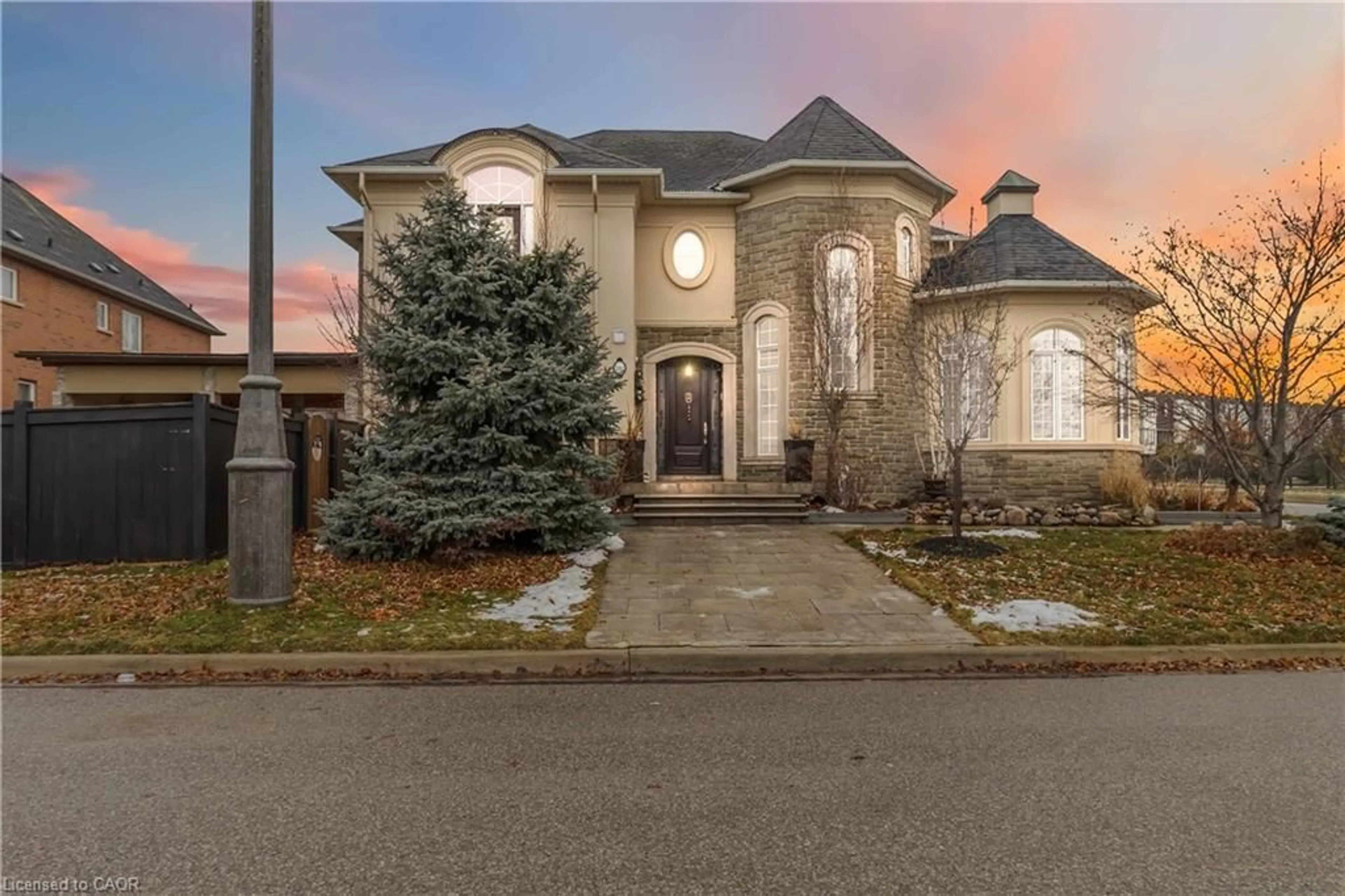 Home with brick exterior material, street for 242 Milkweed Way, Oakville Ontario L6L 0A6