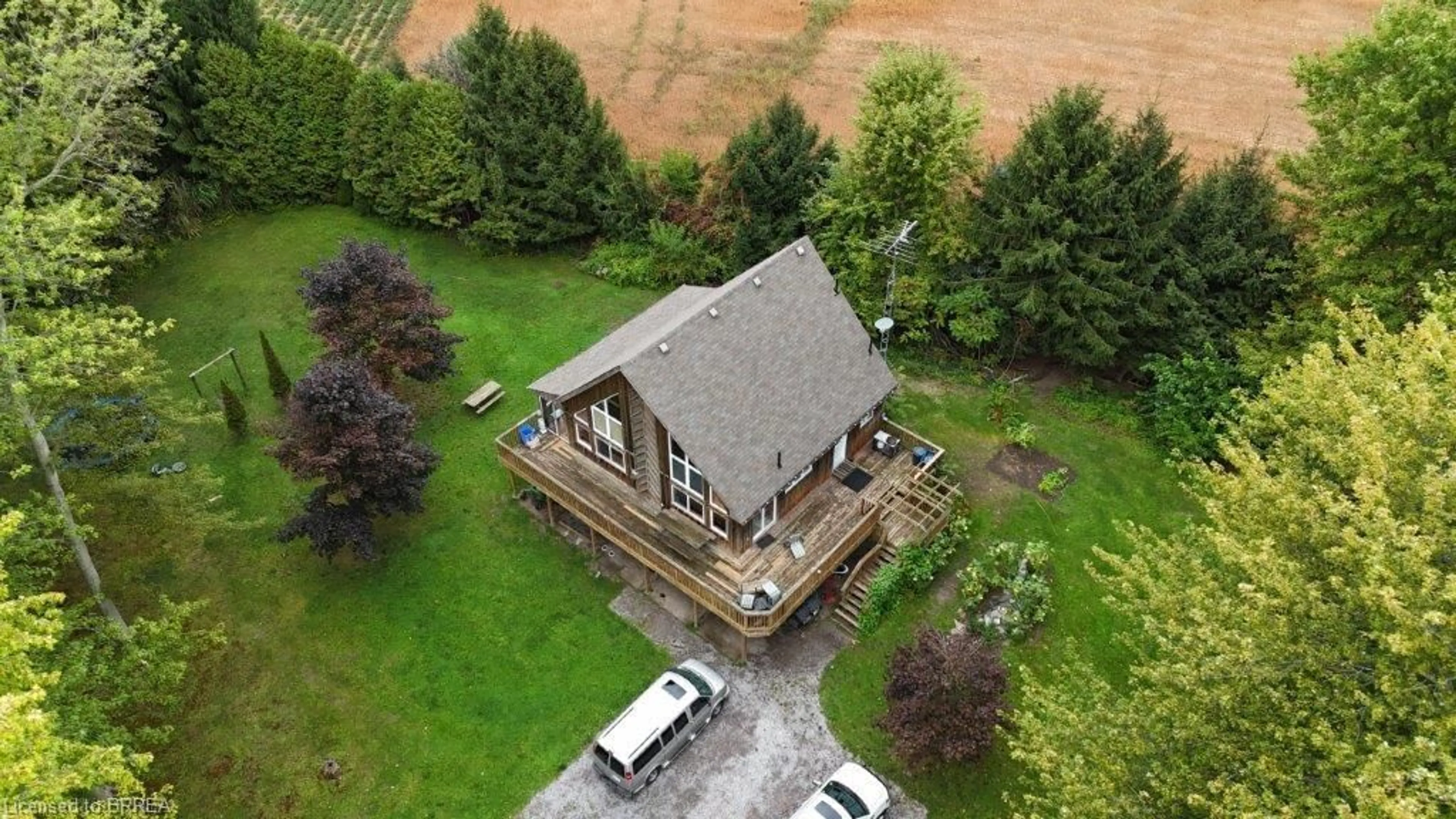 A pic from outside/outdoor area/front of a property/back of a property/a pic from drone, building for 980-990 Norfolk County Road 28 Rd, Langton Ontario N0E 1G0