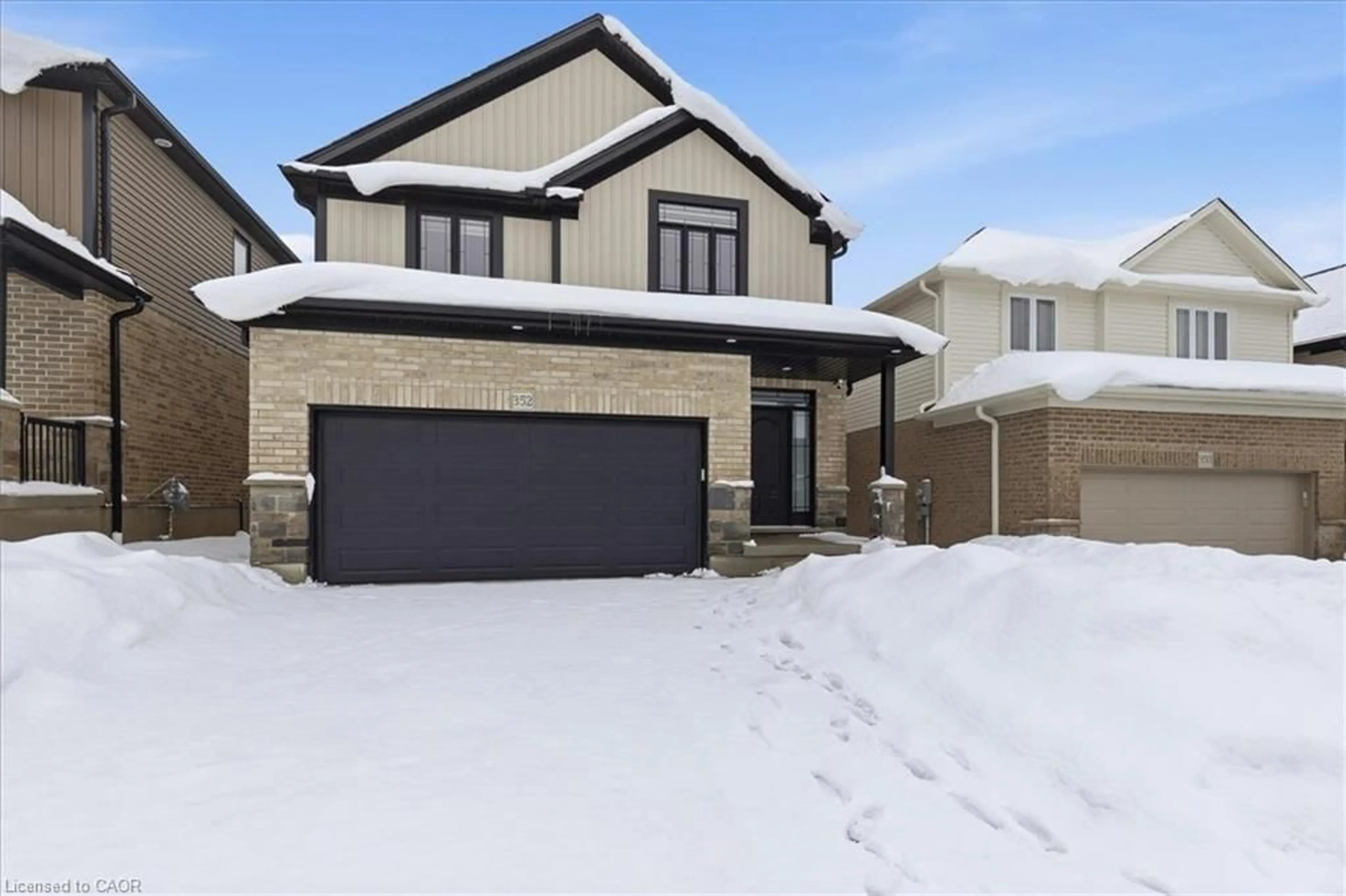 Home with brick exterior material, street for 352 Chokecherry Cres, Waterloo Ontario N2V 0H1