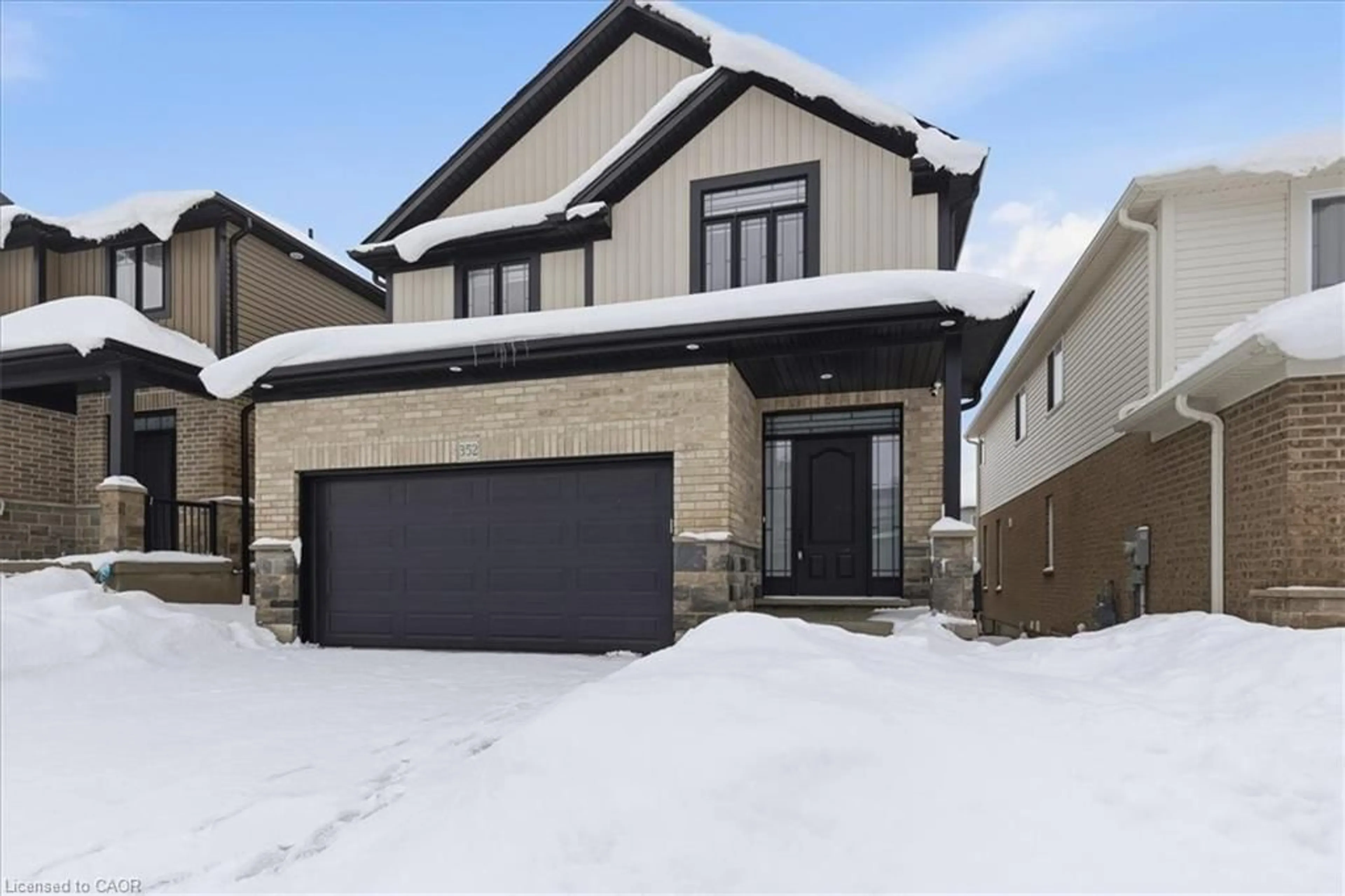 Home with brick exterior material, street for 352 Chokecherry Cres, Waterloo Ontario N2V 0H1