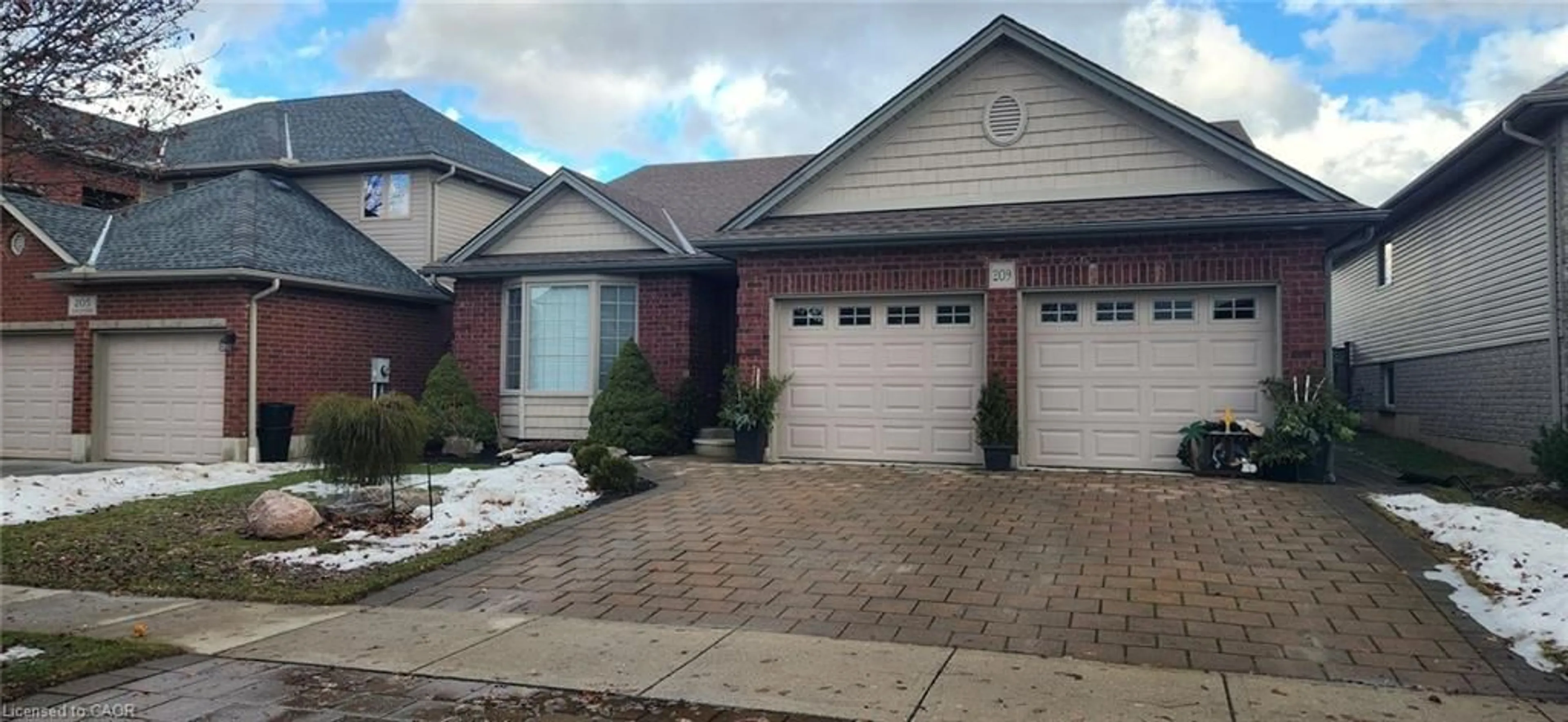 Home with brick exterior material, street for 209 Kingfisher Ave, Woodstock Ontario N4T 0B3