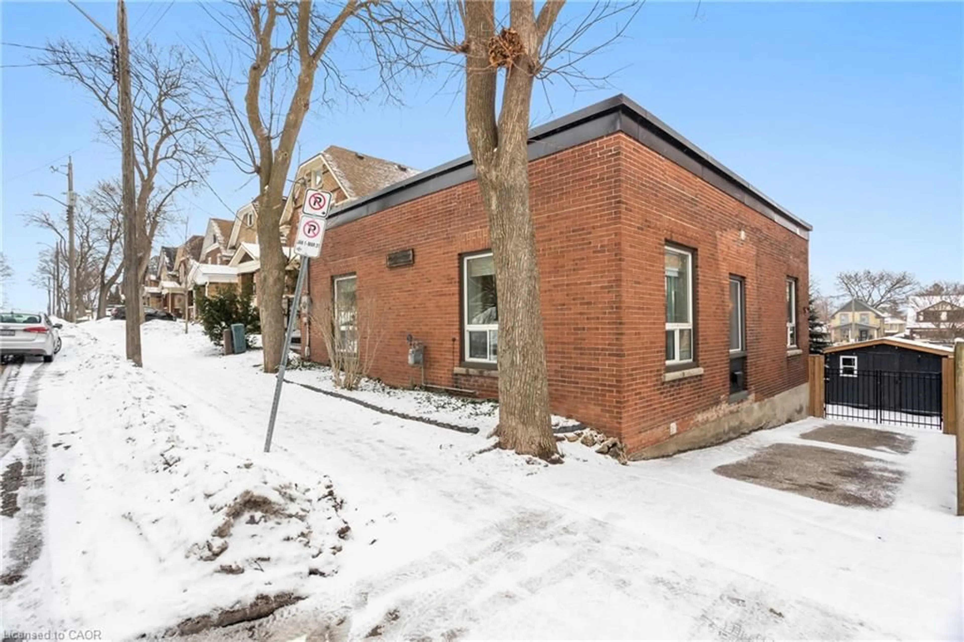 Home with brick exterior material, street for 66 Chestnut St, Kitchener Ontario N2H 1T8
