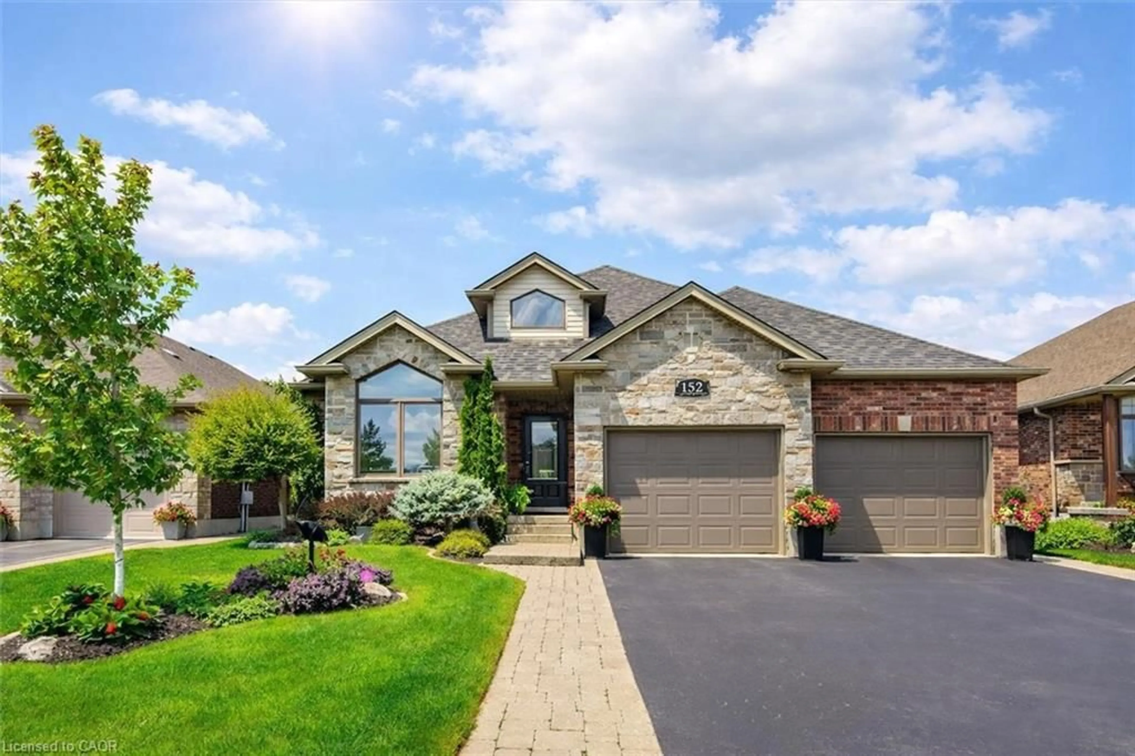 Home with brick exterior material, street for 152 Spencer Dr, Elora Ontario N0B 1S0