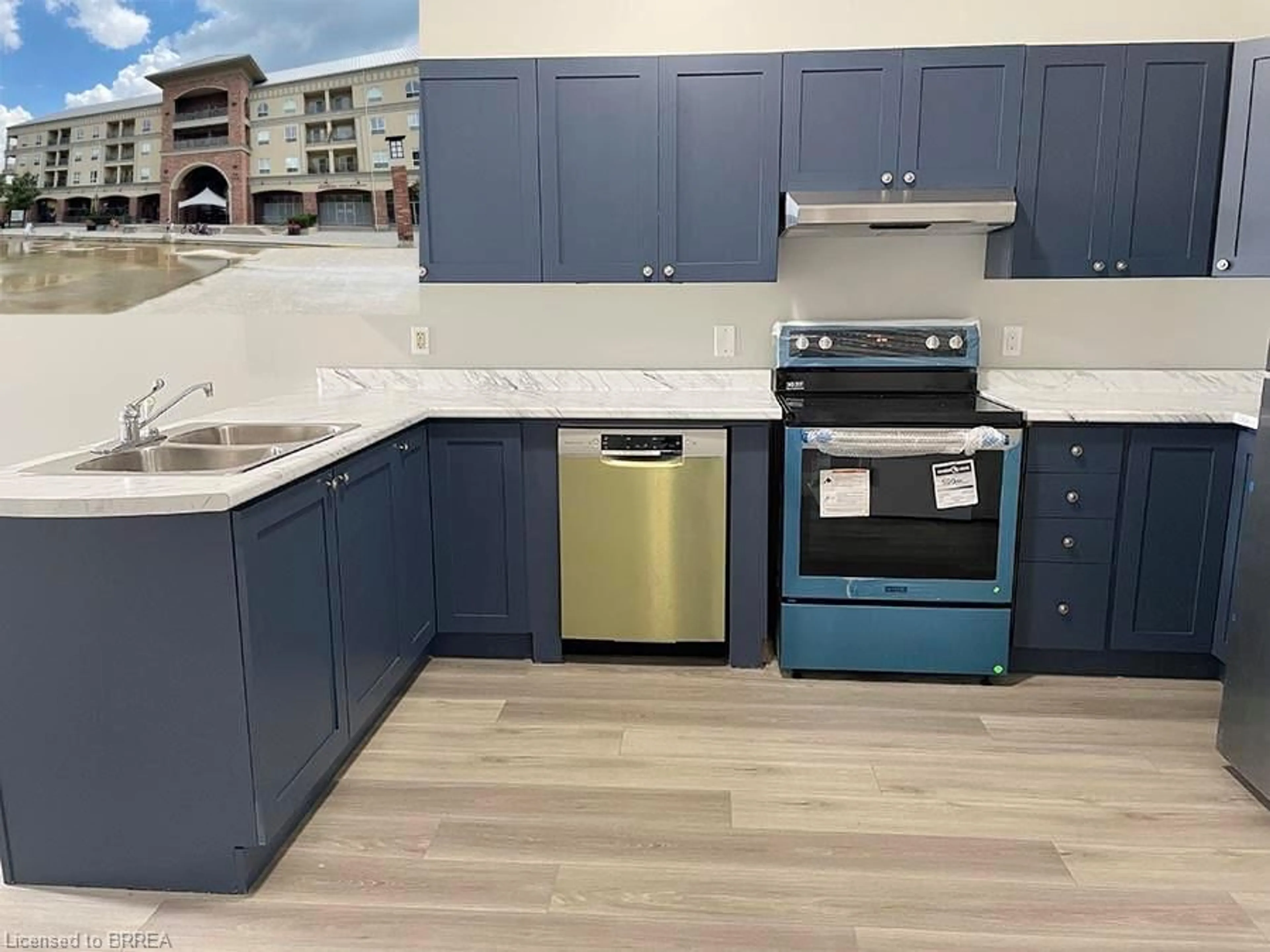 Open concept kitchen, ceramic/tile floor for 150 Colborne St #407, Brantford Ontario N3R 7J4