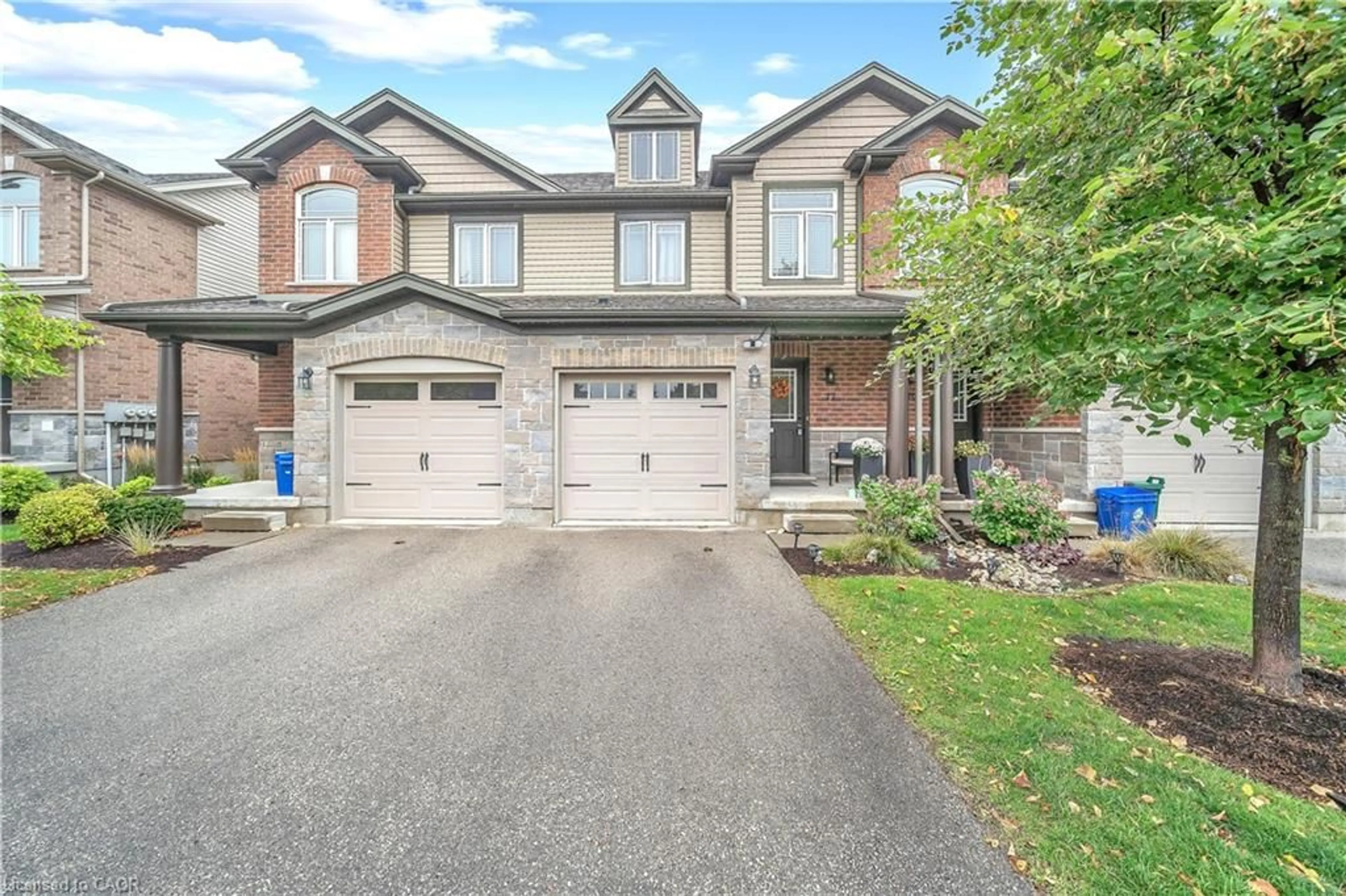 Home with brick exterior material, street for 77 Westminster Cres #68, Fergus Ontario N1M 0C4