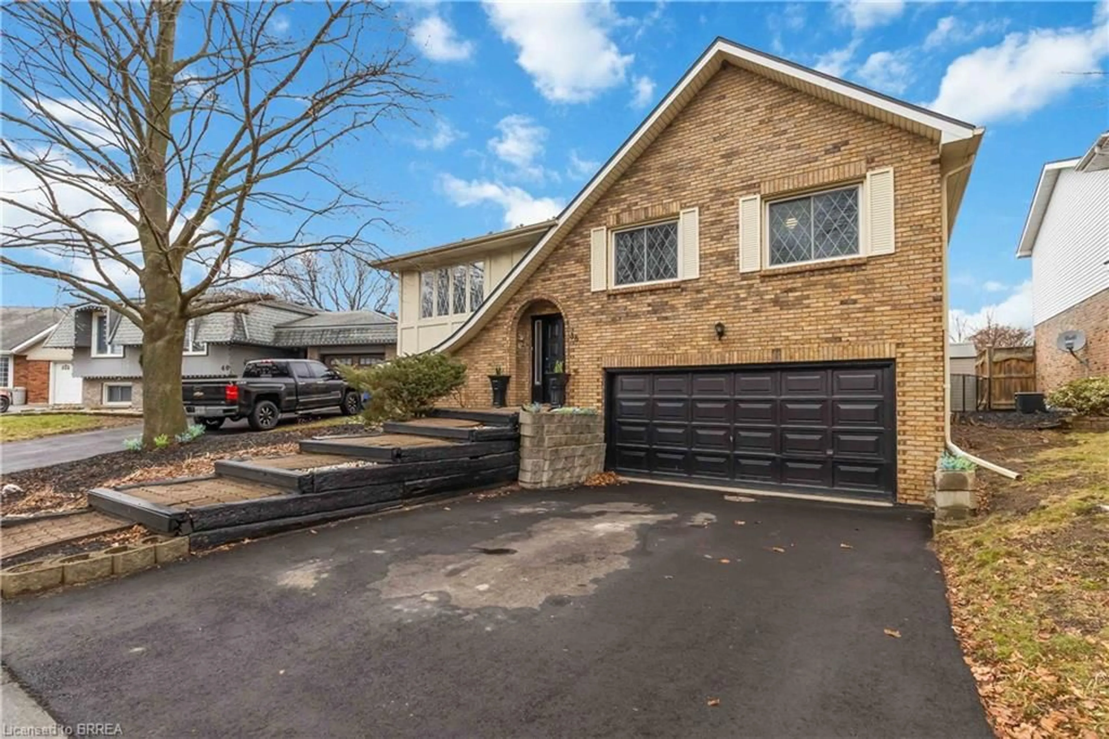 Home with brick exterior material, street for 38 Black Locust Way, Brantford Ontario N3R 7C7