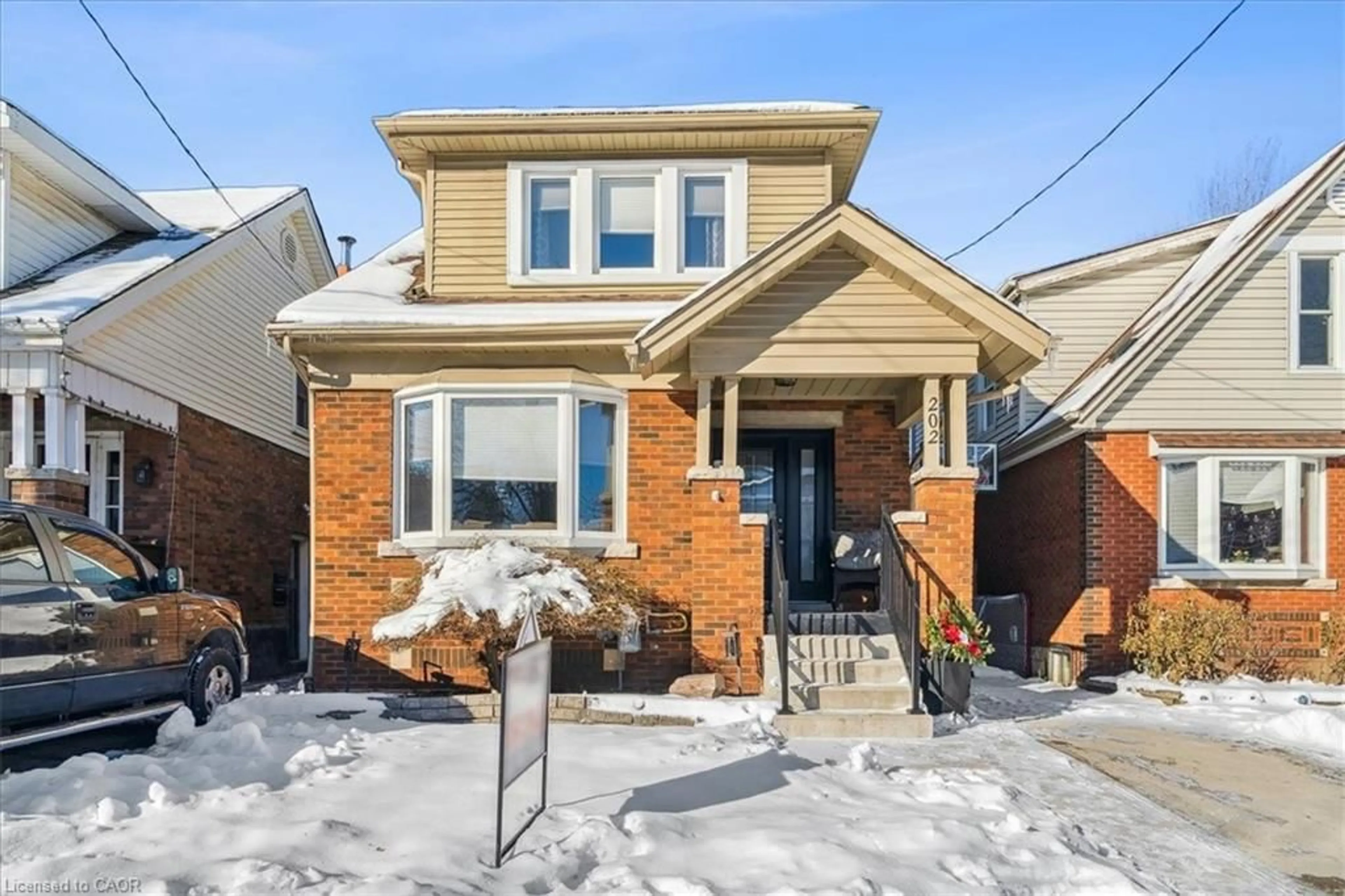 Home with brick exterior material, street for 202 London St, Hamilton Ontario L8K 2G9