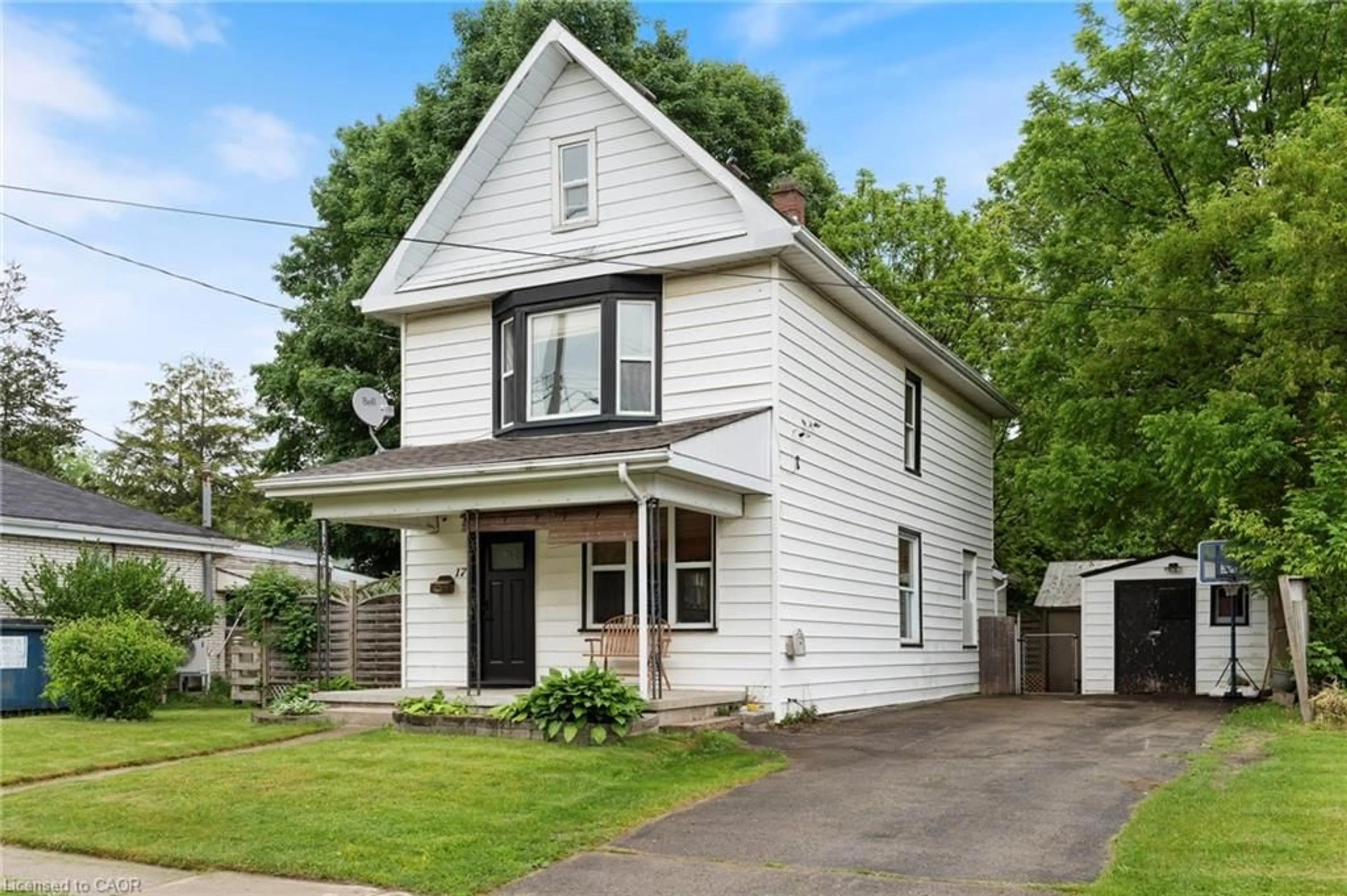 Home with vinyl exterior material, street for 17 Bertha St, Simcoe Ontario N3Y 3M6