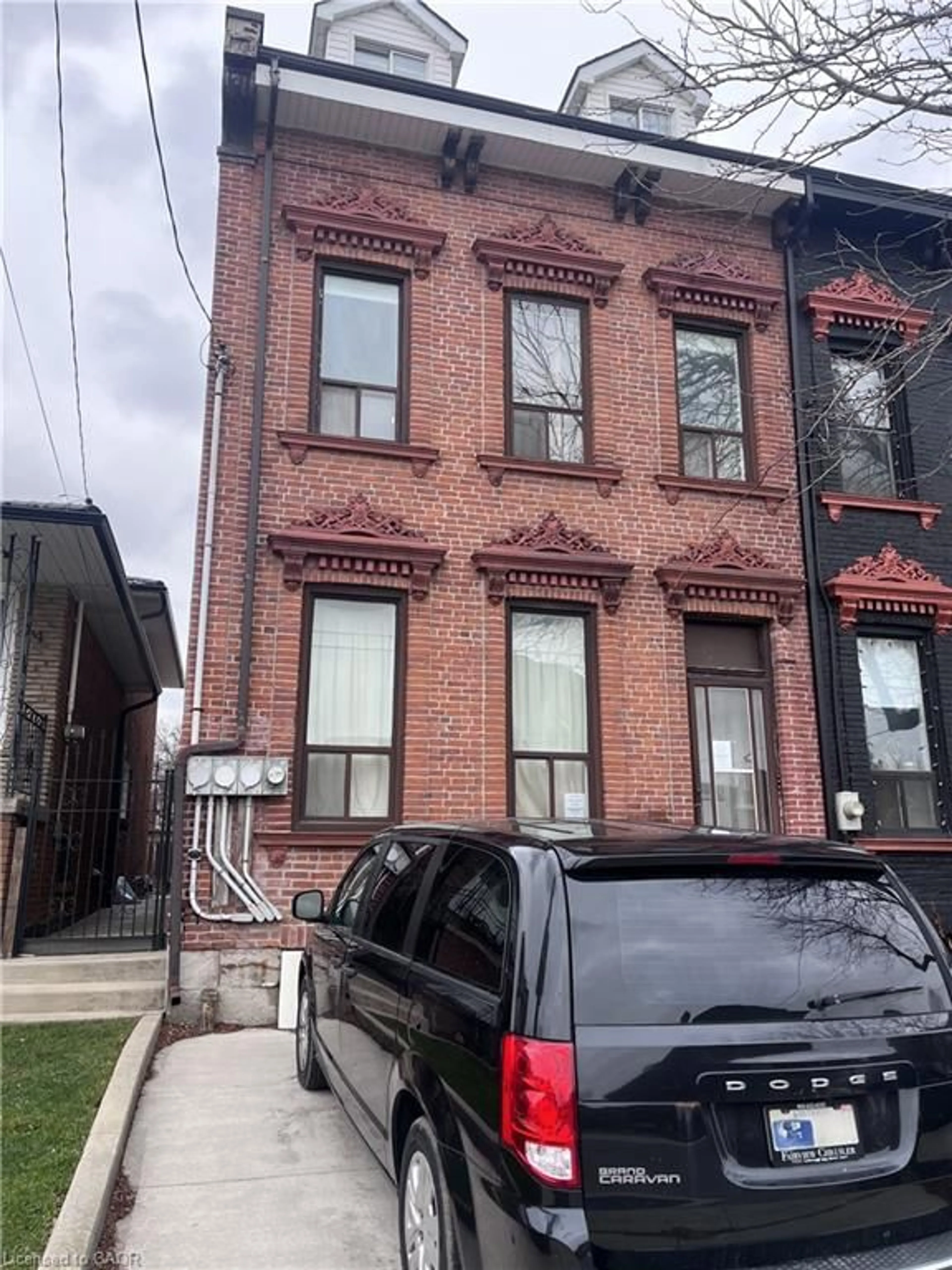 Home with brick exterior material, street for 223 Park St, Hamilton Ontario L8R 2N9