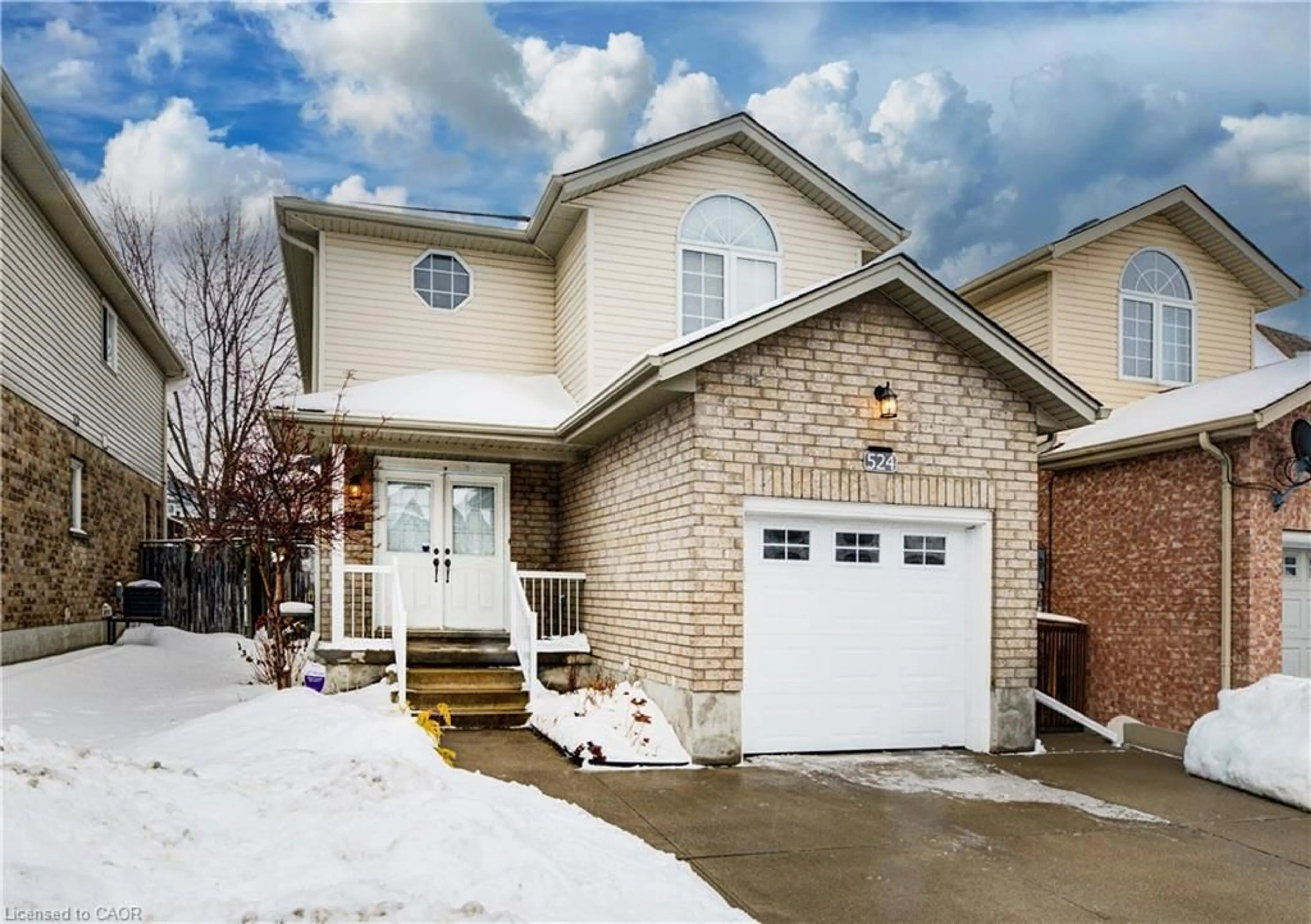 Home with brick exterior material, street for 524 Windflower Cres, Kitchener Ontario N2E 3S9