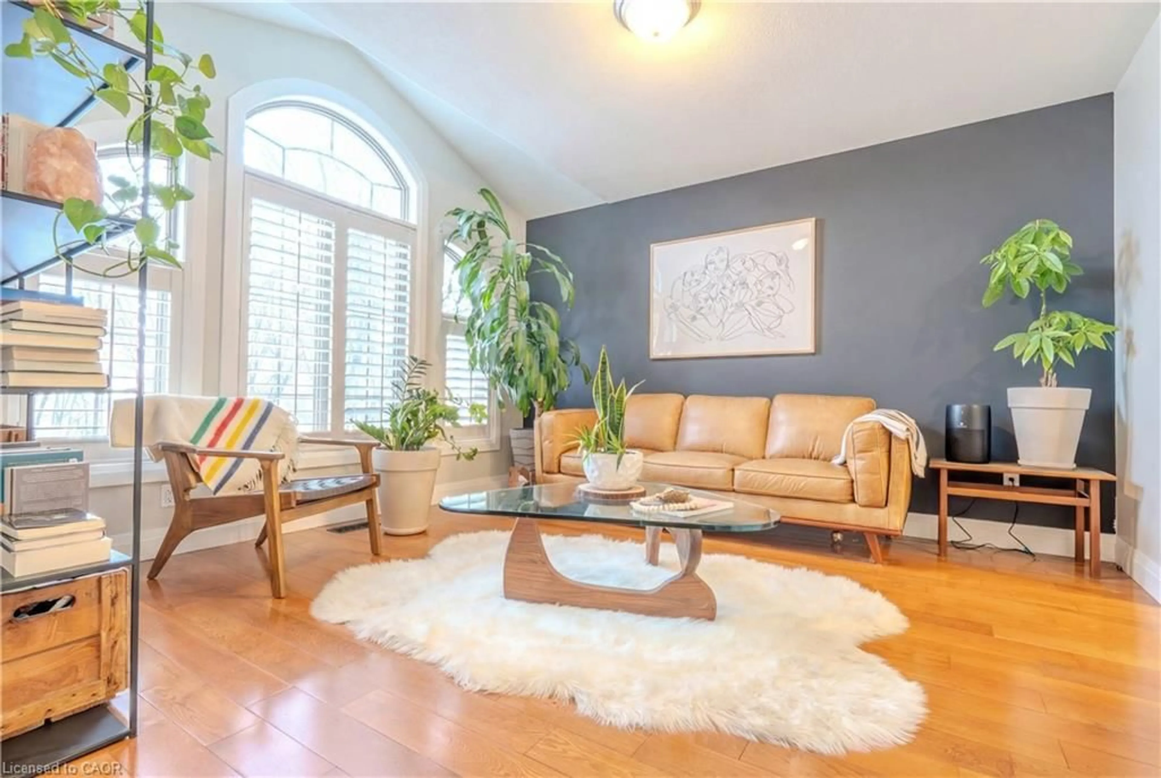 Living room with furniture, wood/laminate floor for 17 Krieghoff Dr, Hamilton Ontario L9B 2L4