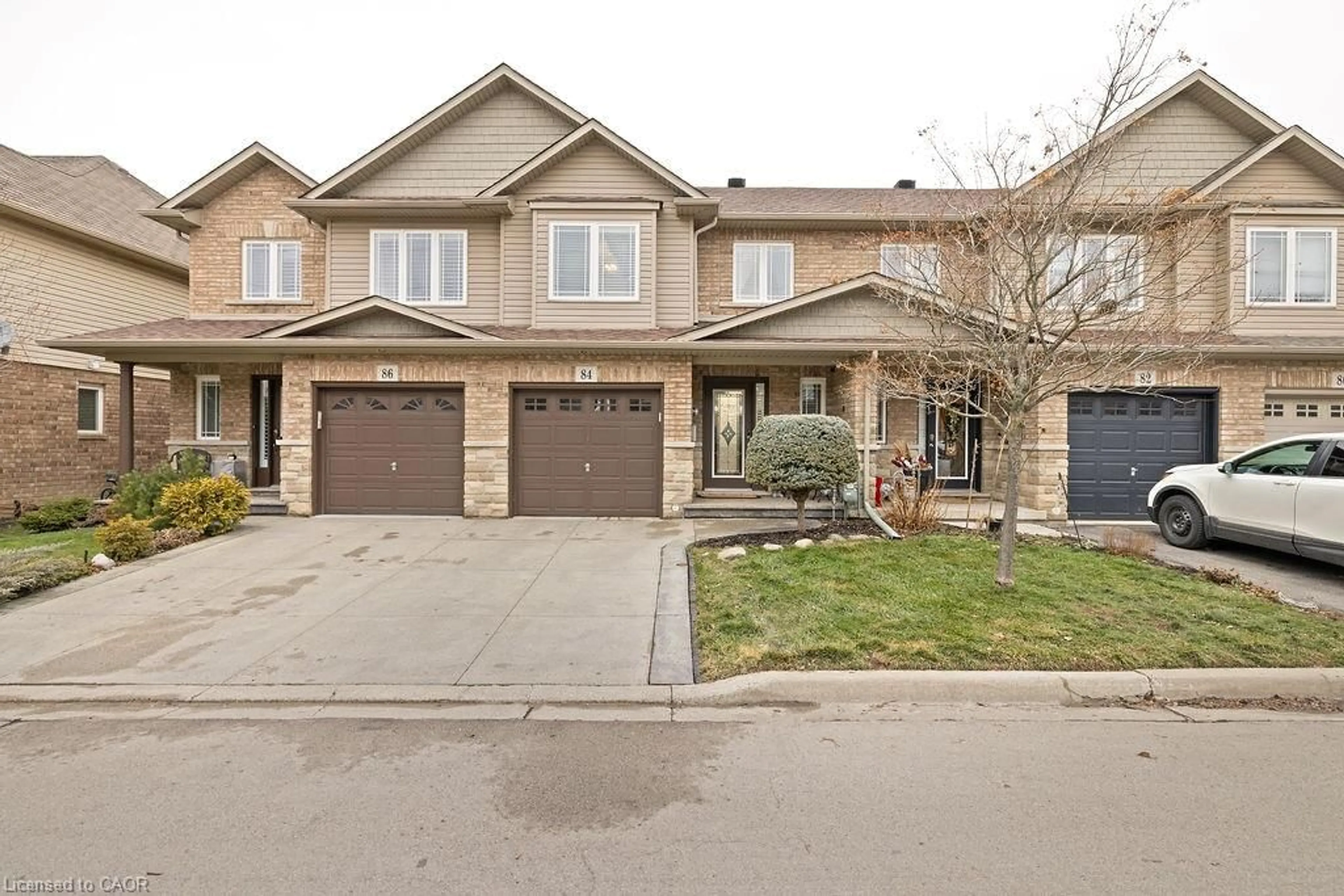 Home with brick exterior material, street for 84 Periwinkle Dr, Stoney Creek Ontario L0R 1P0