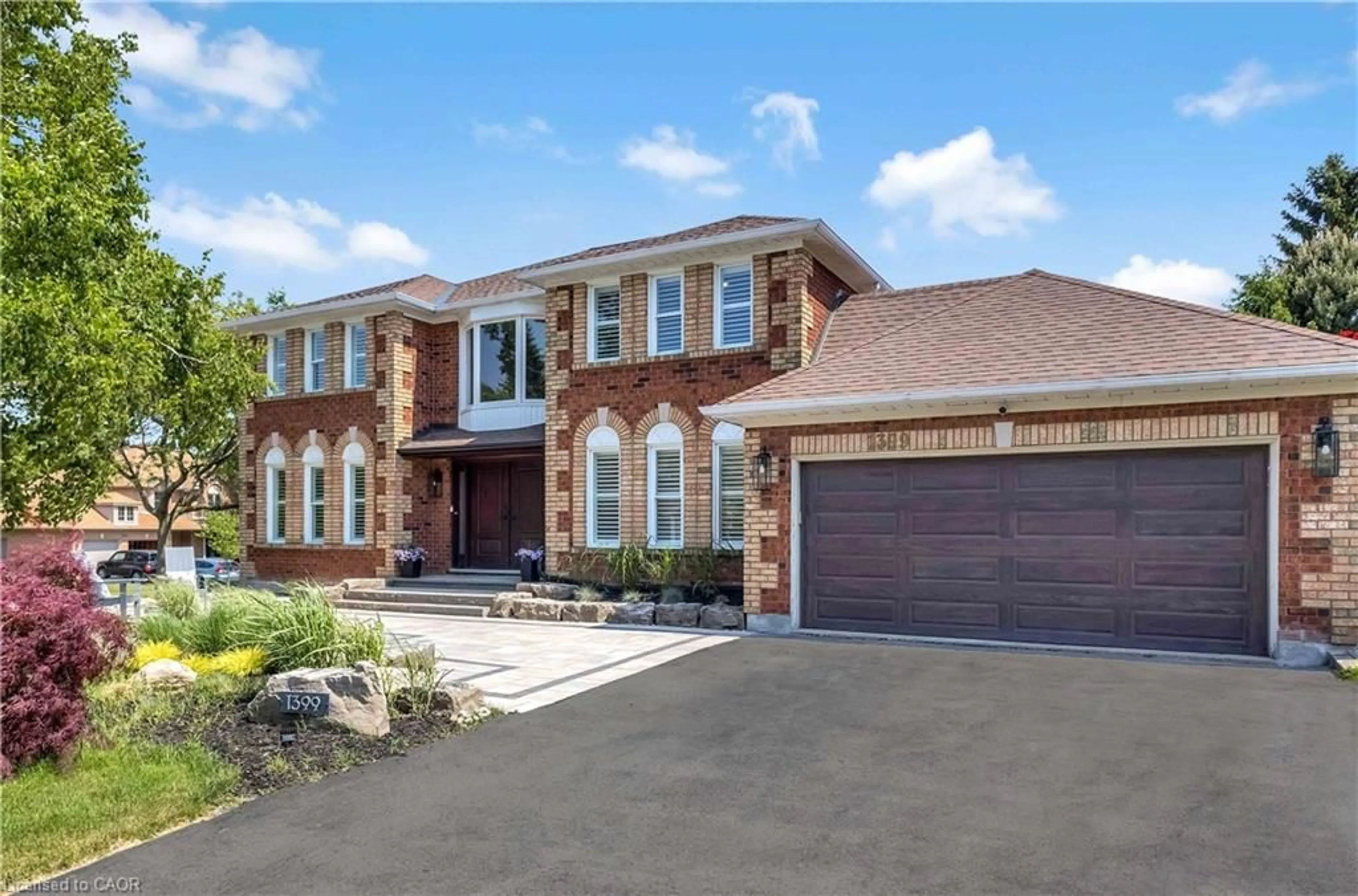 Home with brick exterior material, street for 1399 Winterberry Dr, Burlington Ontario L7P 4T3