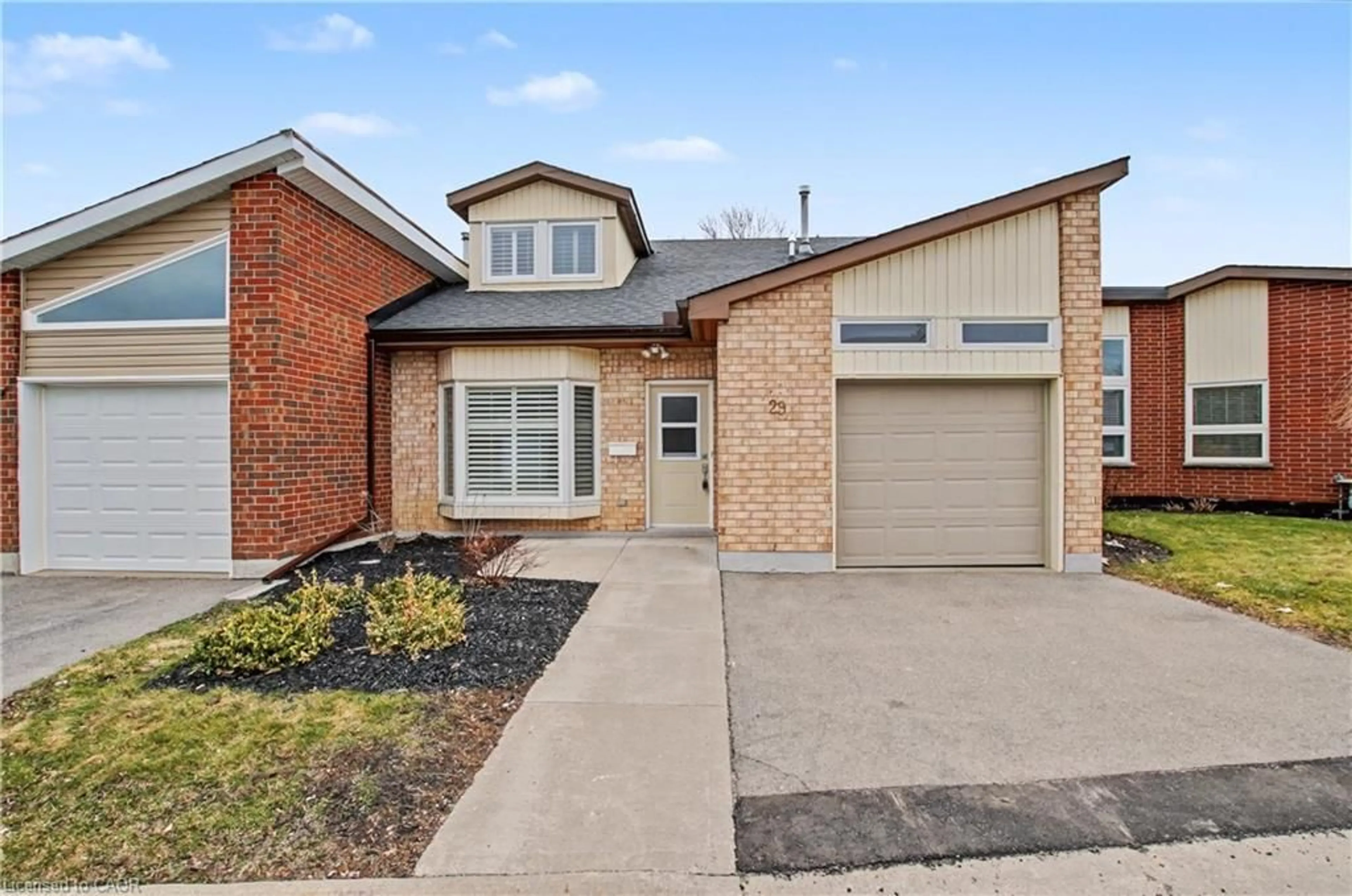 Home with brick exterior material, street for 29 Archdeacon Clark Trail, Hamilton Ontario L9B 2M1