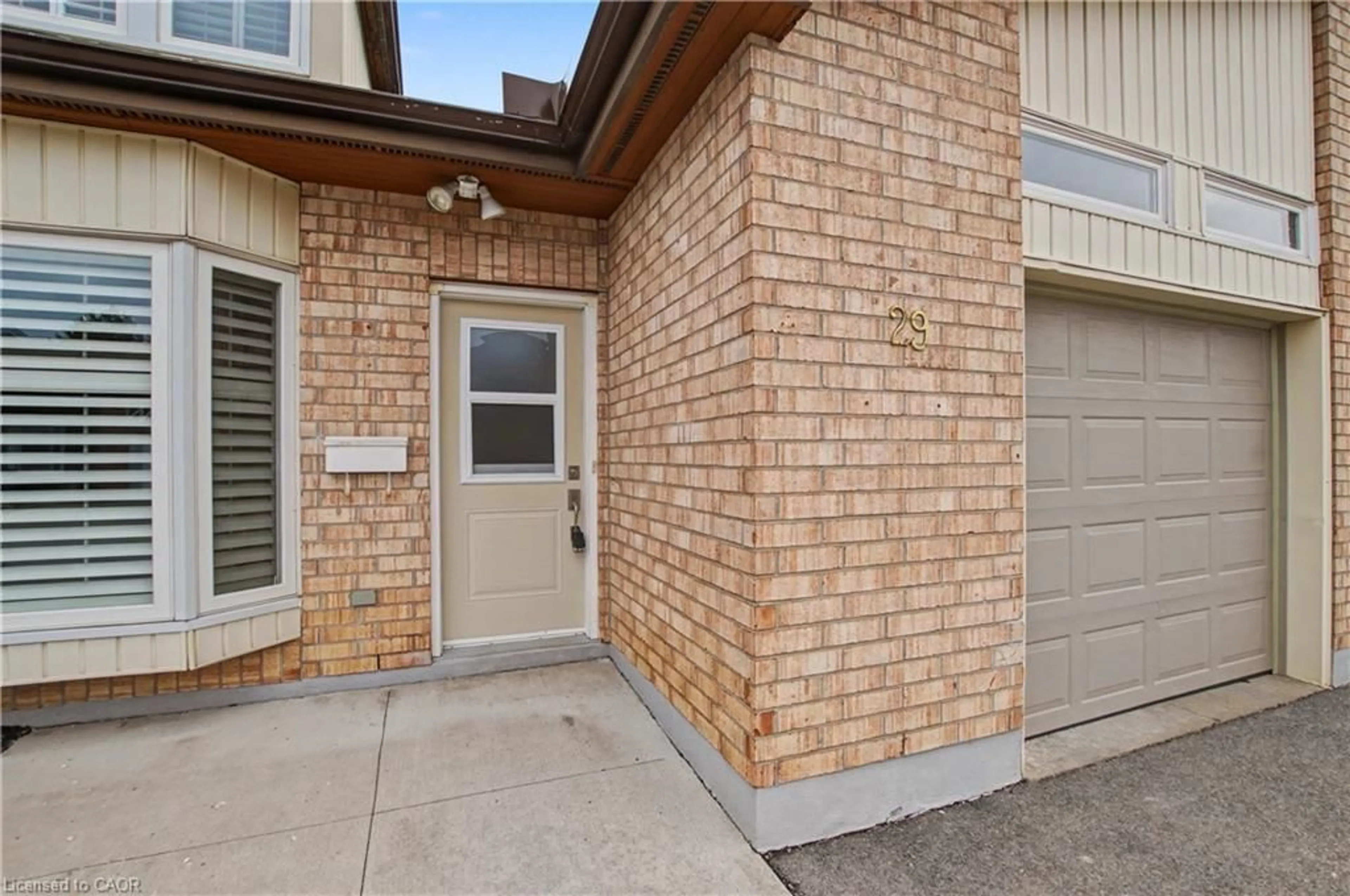Home with brick exterior material, street for 29 Archdeacon Clark Trail, Hamilton Ontario L9B 2M1