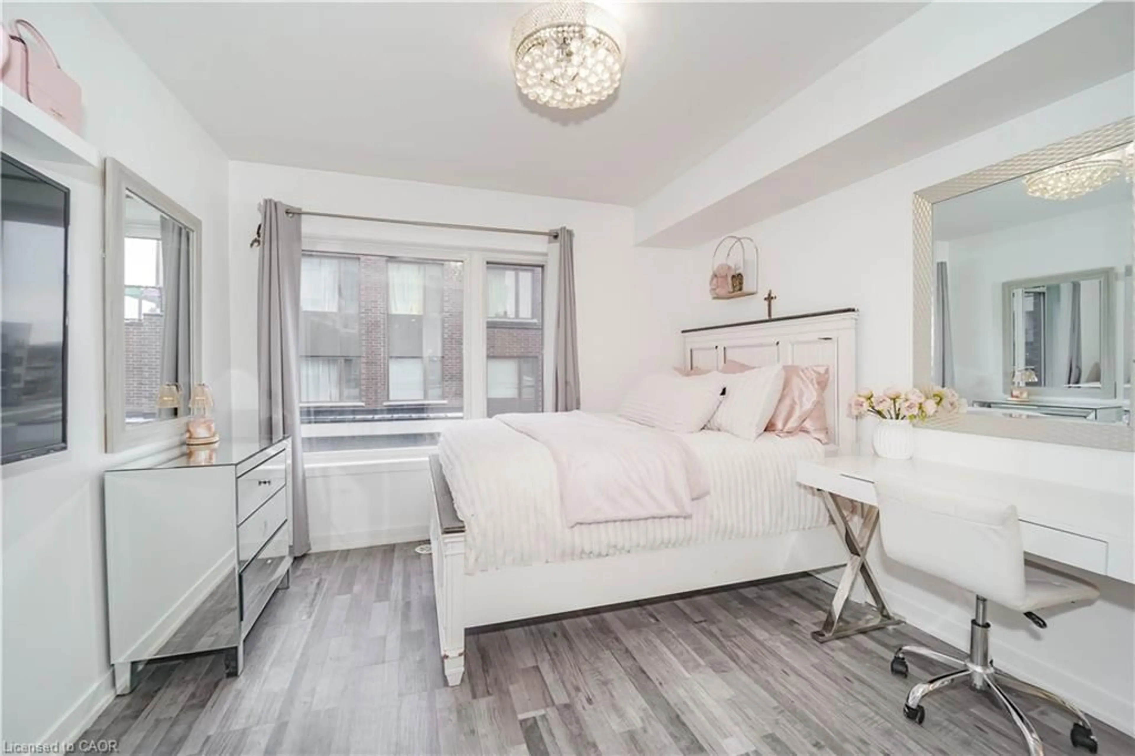 Bedroom with bed, wood/laminate floor for 1460 Whites Rd #211, Pickering Ontario L1V 0E8