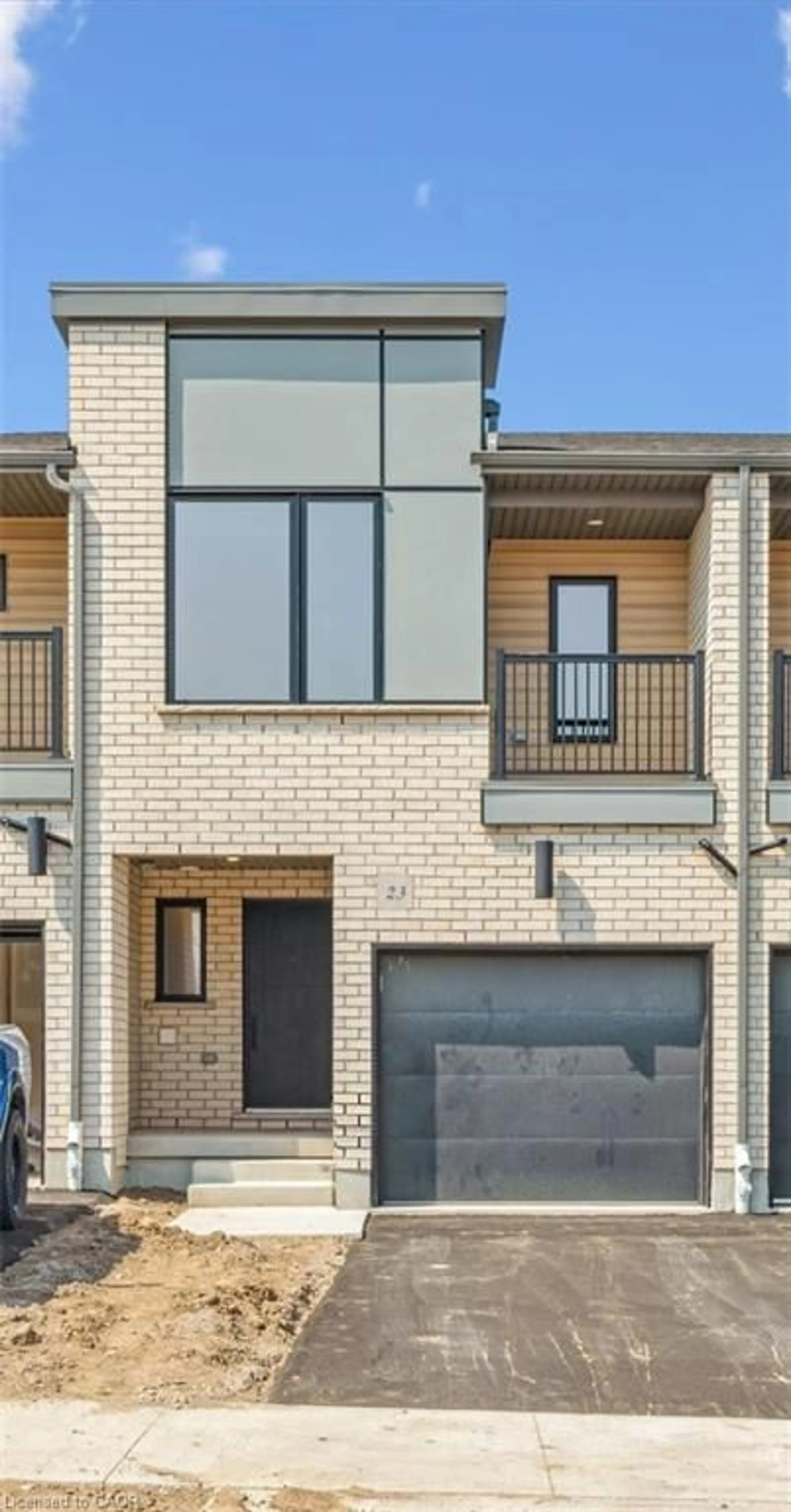 Home with brick exterior material, street for 23 Benninger Dr, Kitchener Ontario N2E 0K4